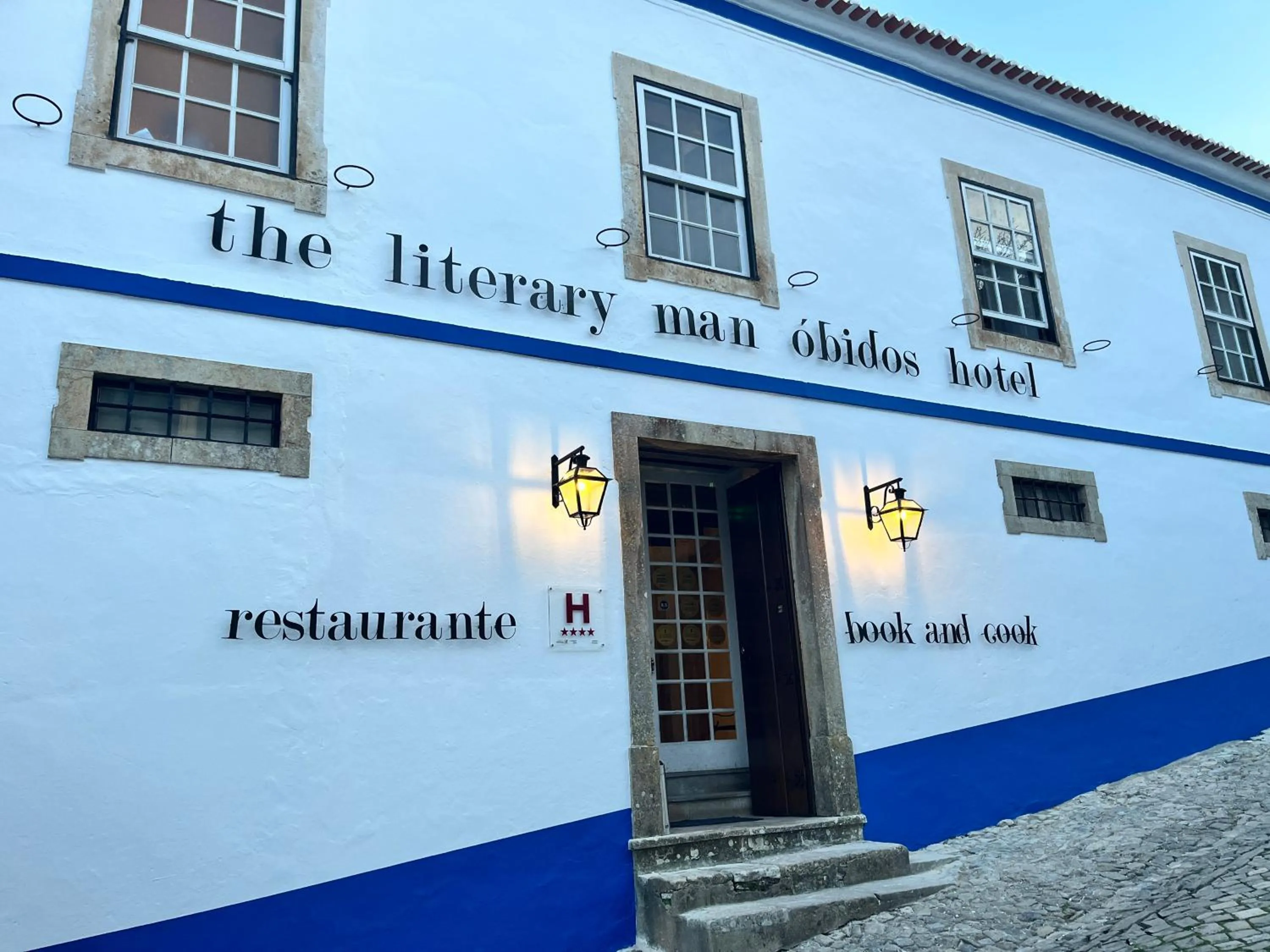 Property building in The Literary Man Obidos Hotel