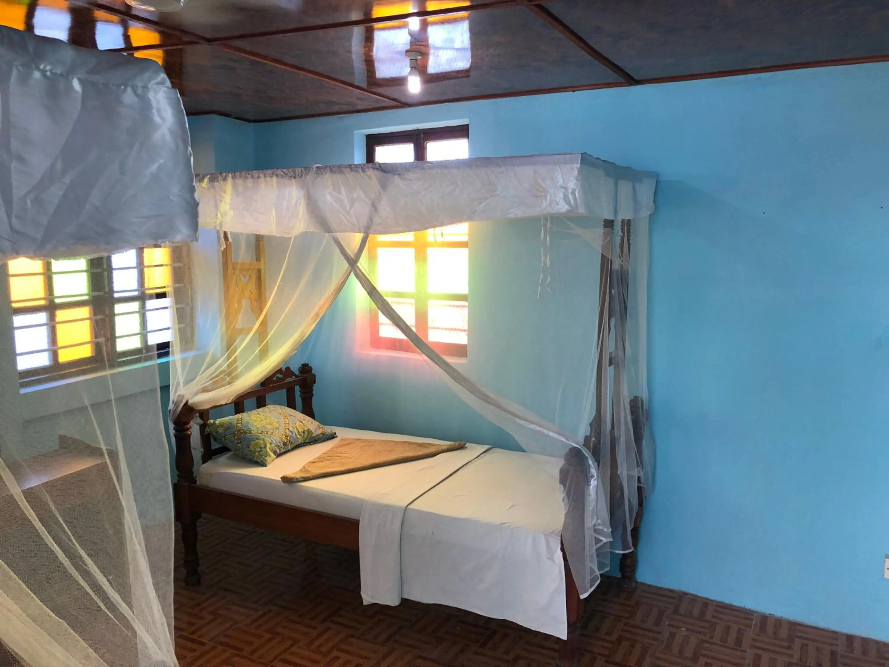 Photo of the whole room, Bed in Bottoms Up