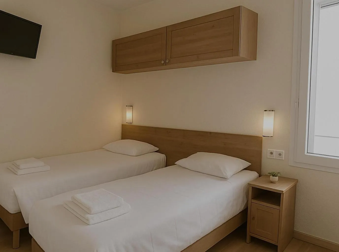 Bed in Résidence Molière Hôtel Paris Montrouge