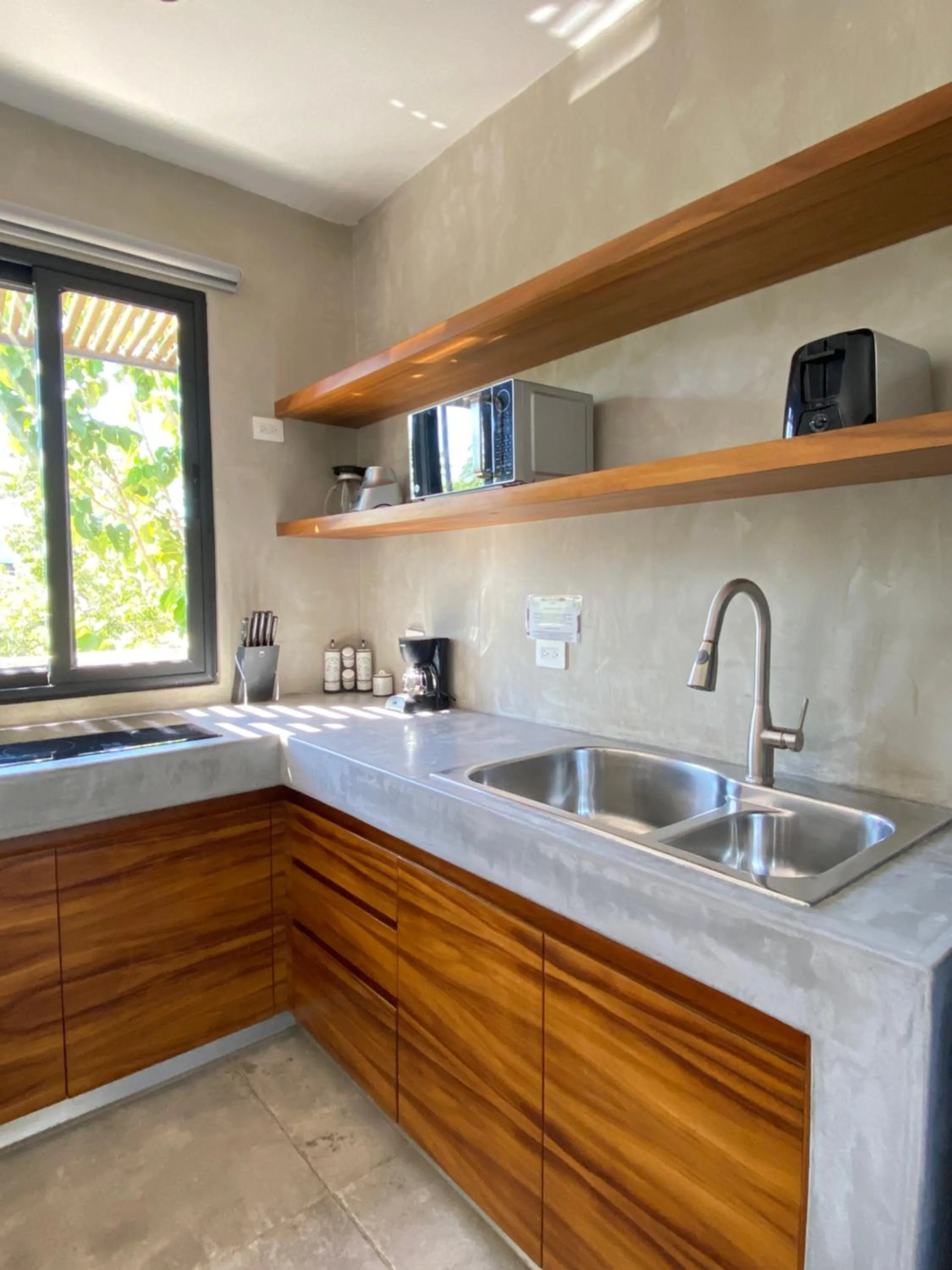 Kitchen or kitchenette in Panacea Condo Tulum