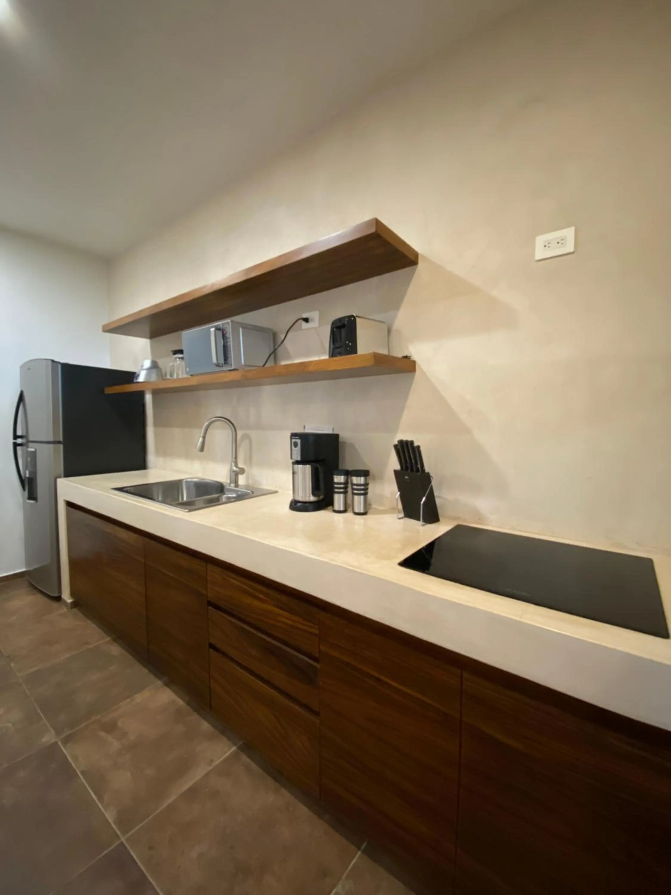 Kitchen or kitchenette in Panacea Condo Tulum
