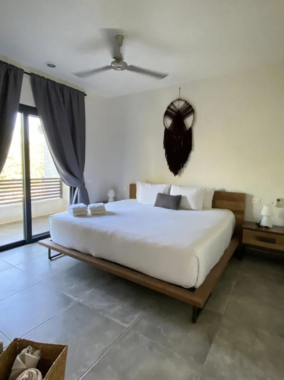Bedroom, Bed in Panacea Condo Tulum
