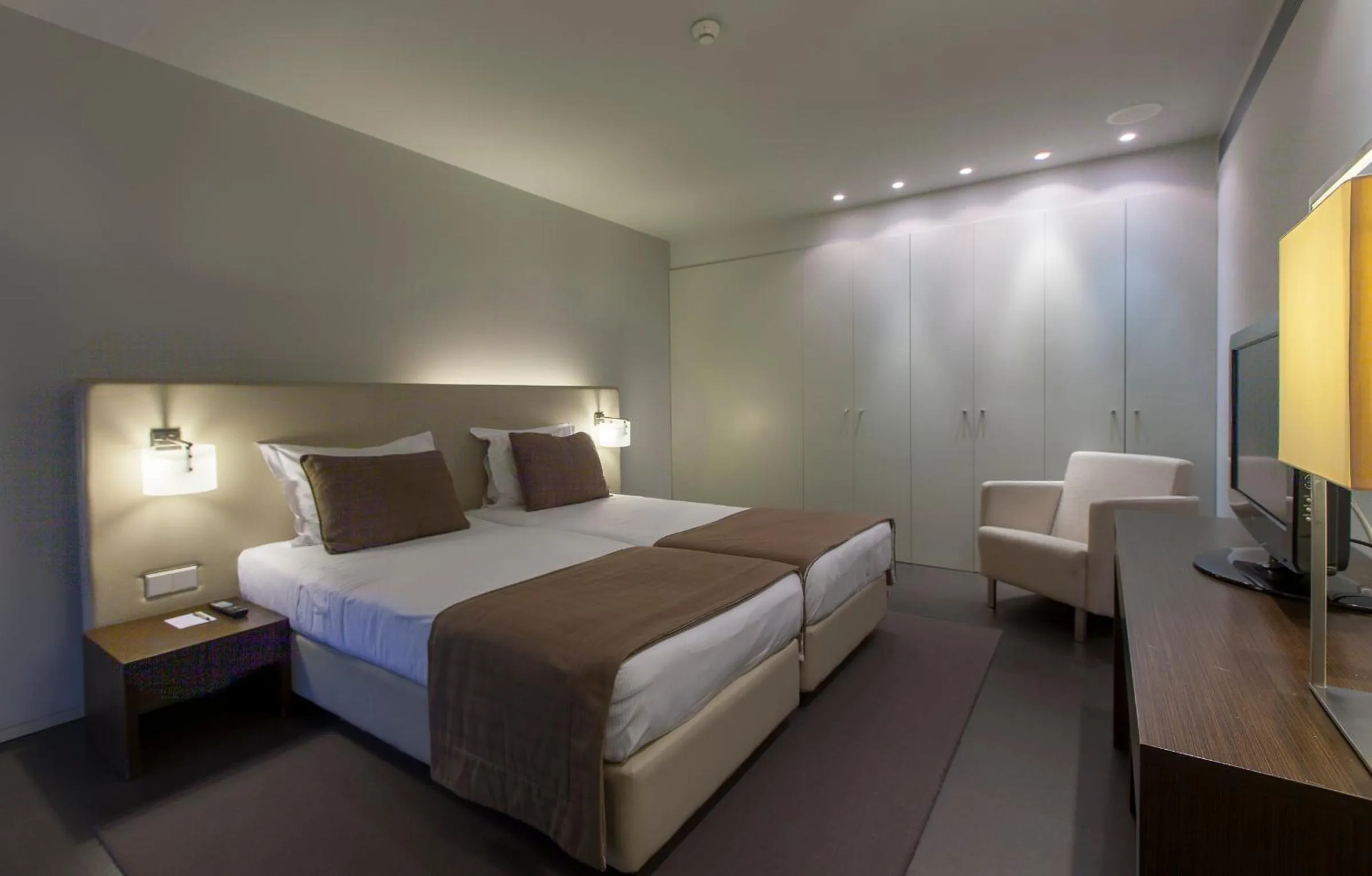 Bed in Aqualuz Troia Rio by The Editory