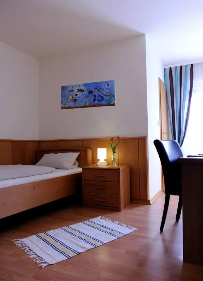 Photo of the whole room, Bed in Hotel Restaurant zum Schlossberg