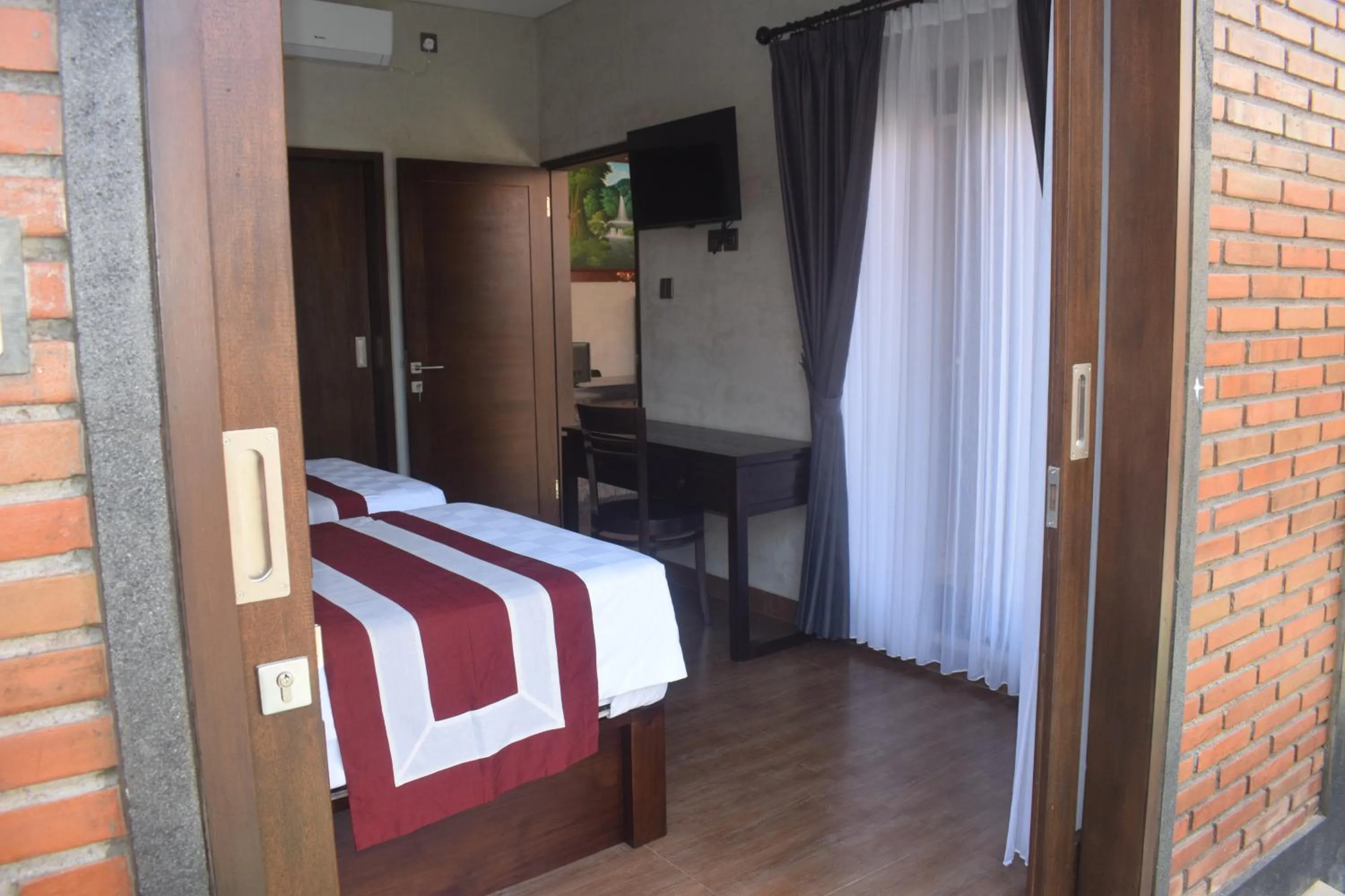 Bed in Werkudara Guest House