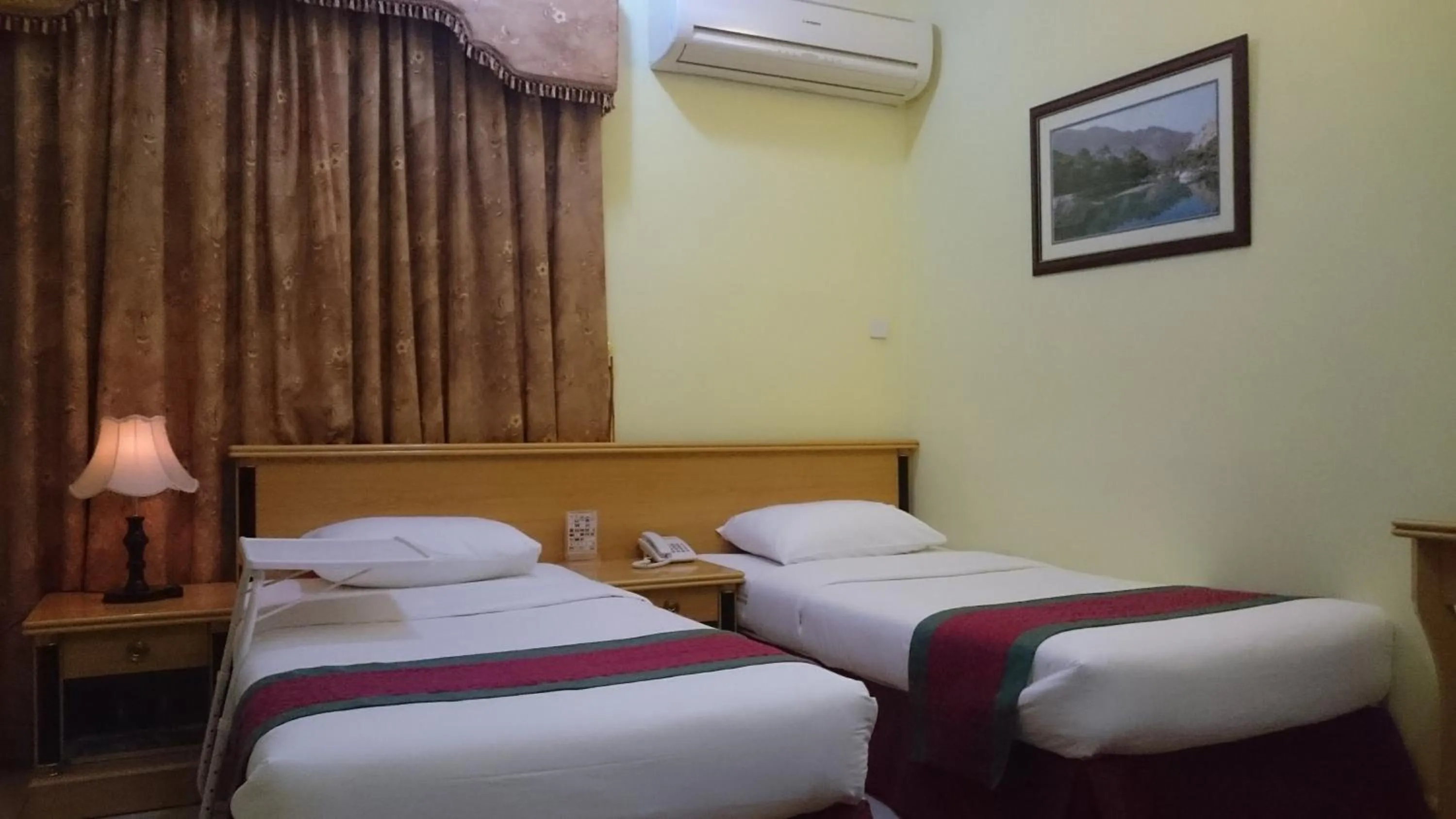 Bed in Muscat International Hotel