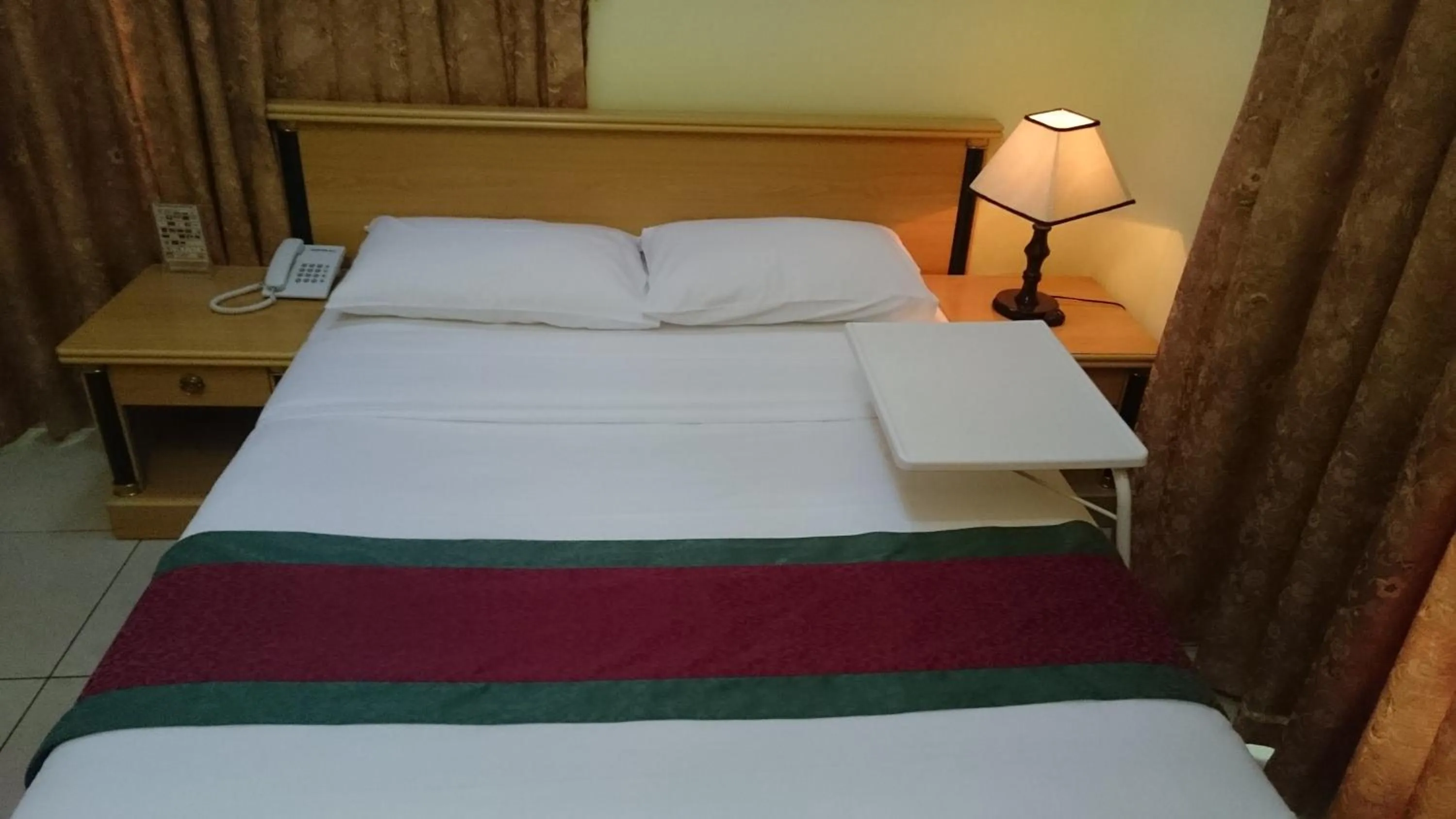 Bed in Muscat International Hotel