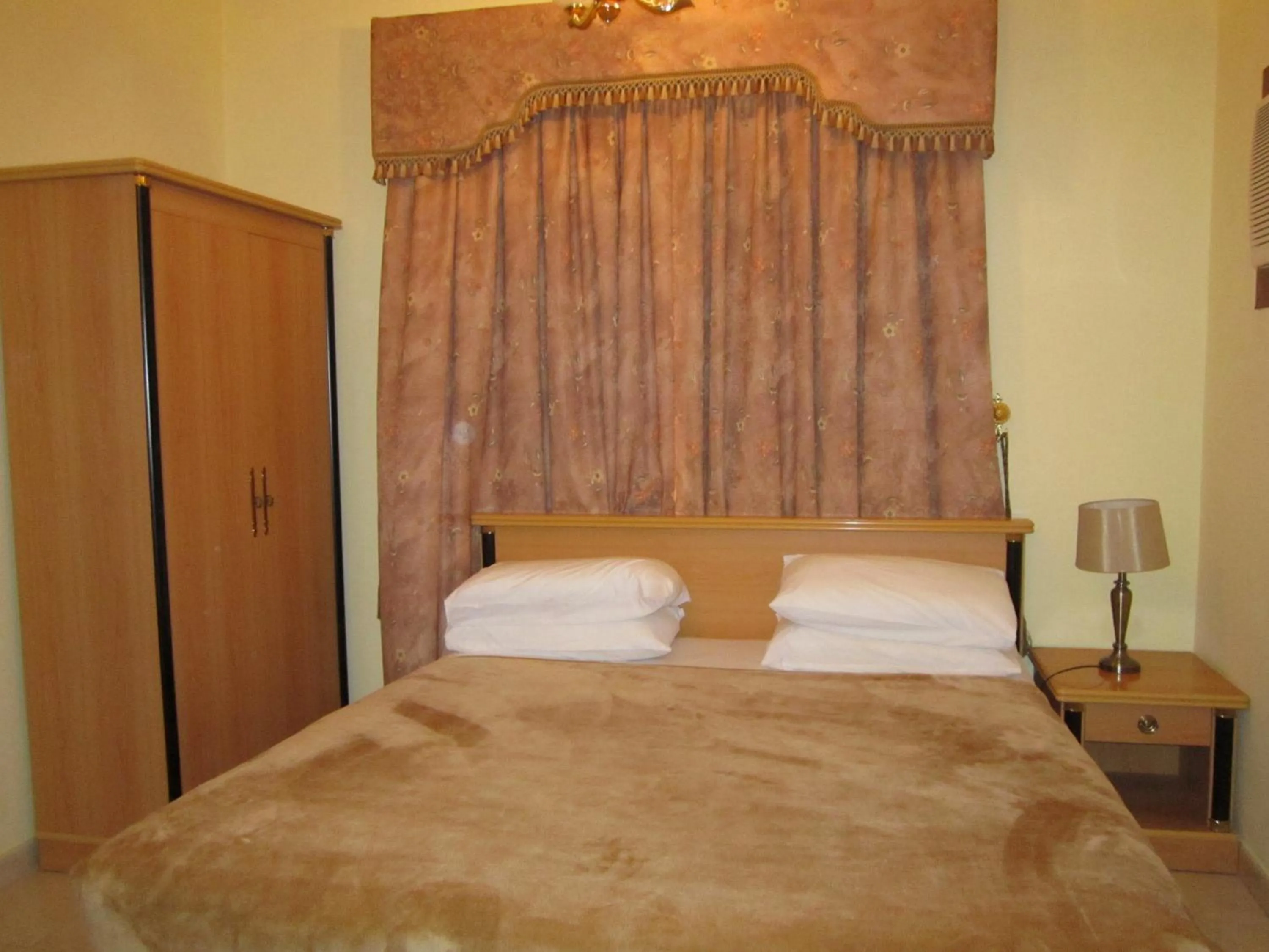 Bed in Muscat International Hotel