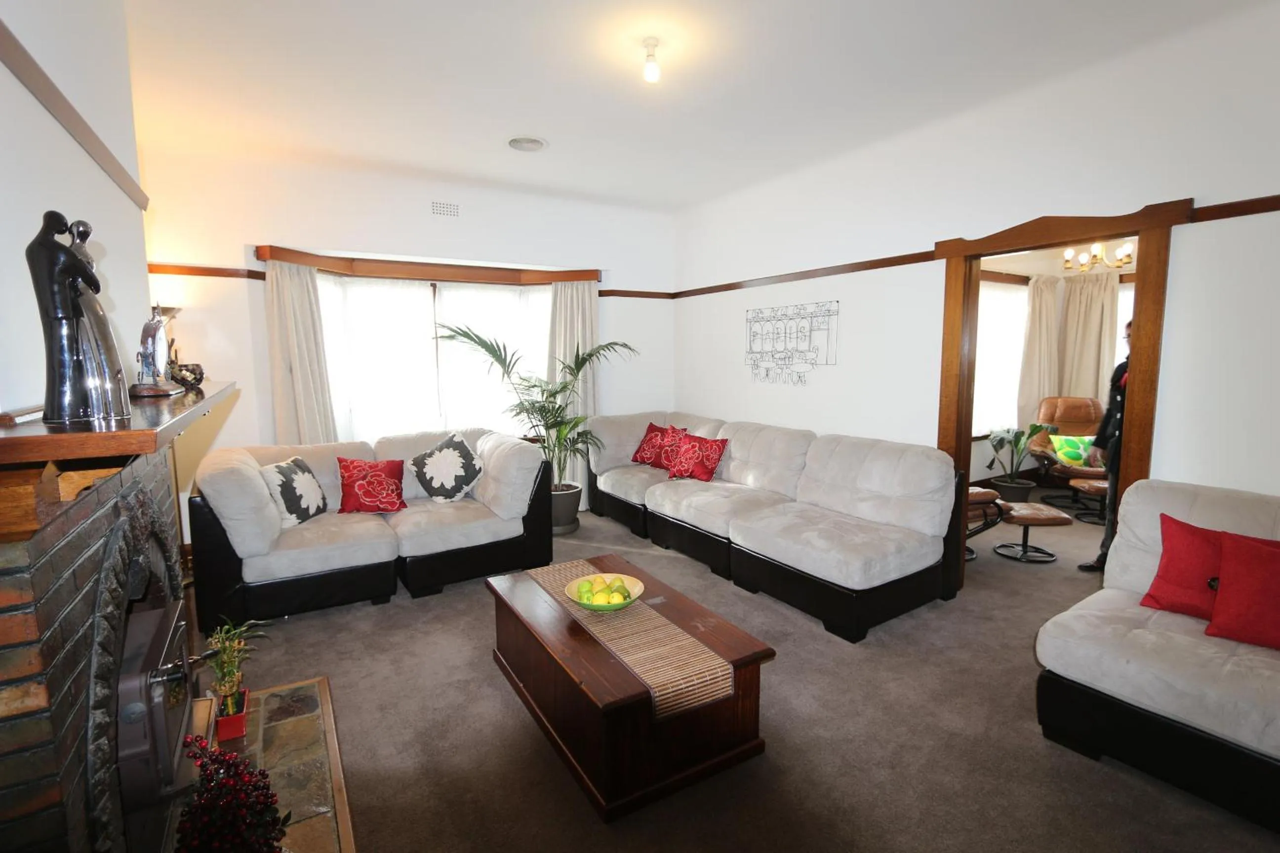 Living room, Bed in Moonah Central Apartments