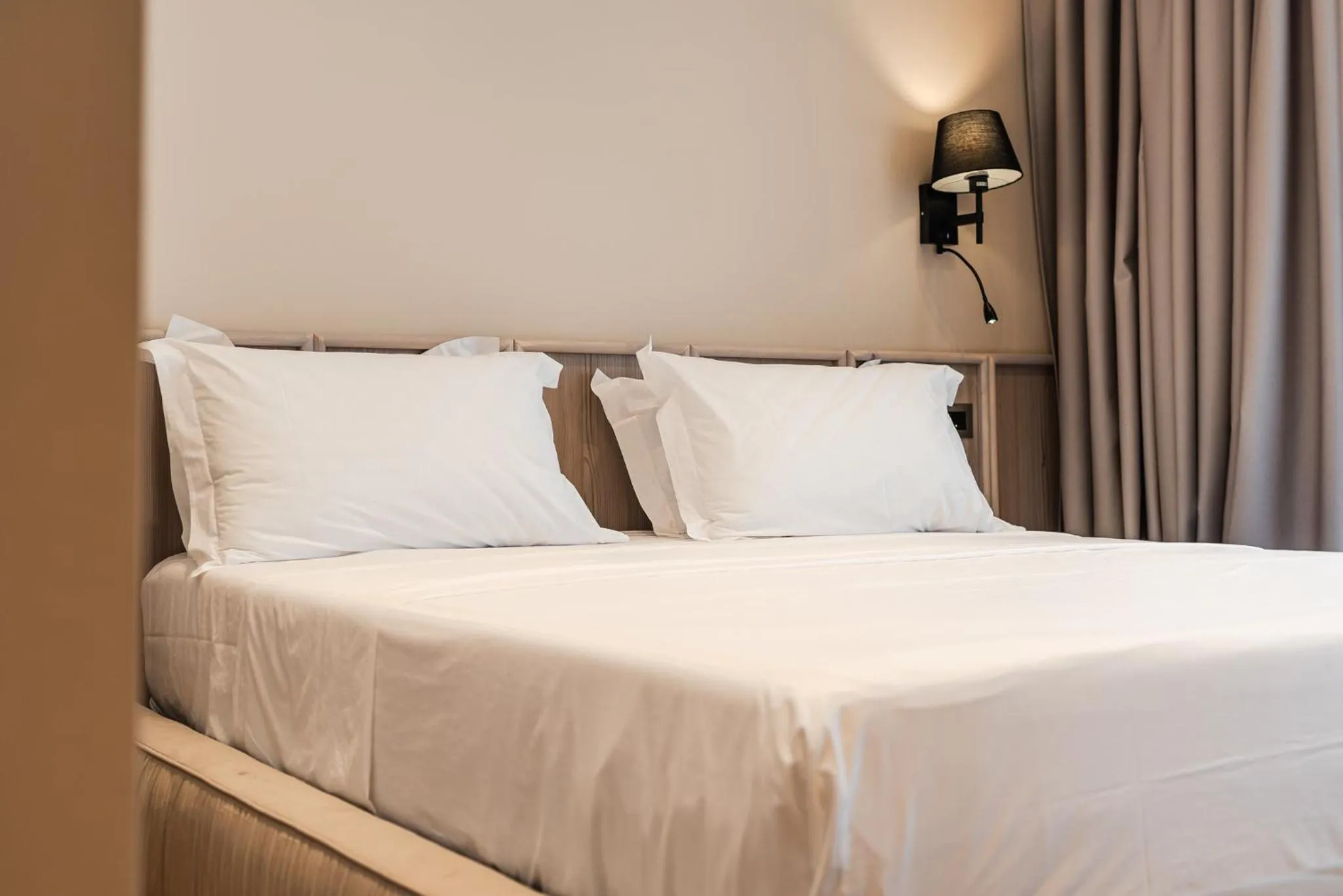 Bed in Aragosta Hotel