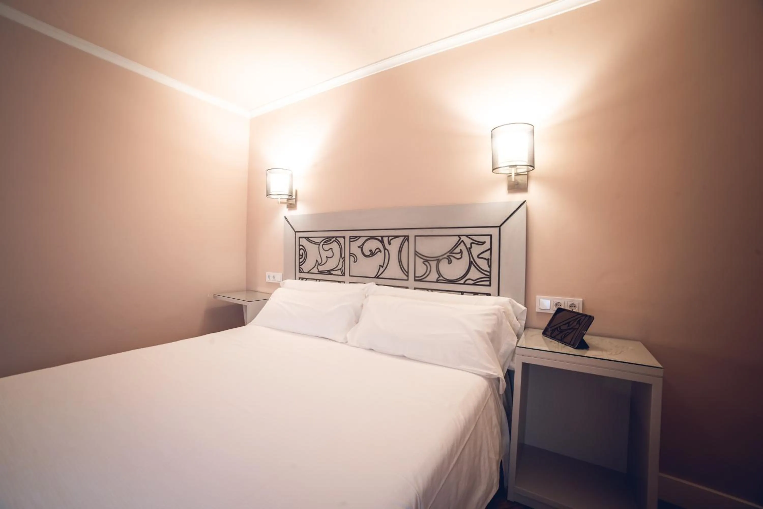 Bed in Hostal Los Castañuelos