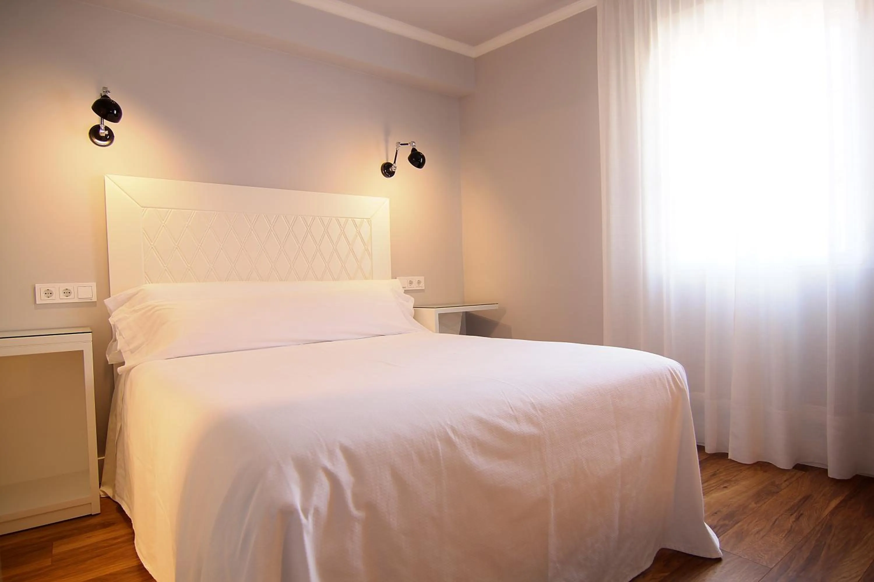 Bed in Hostal Los Castañuelos