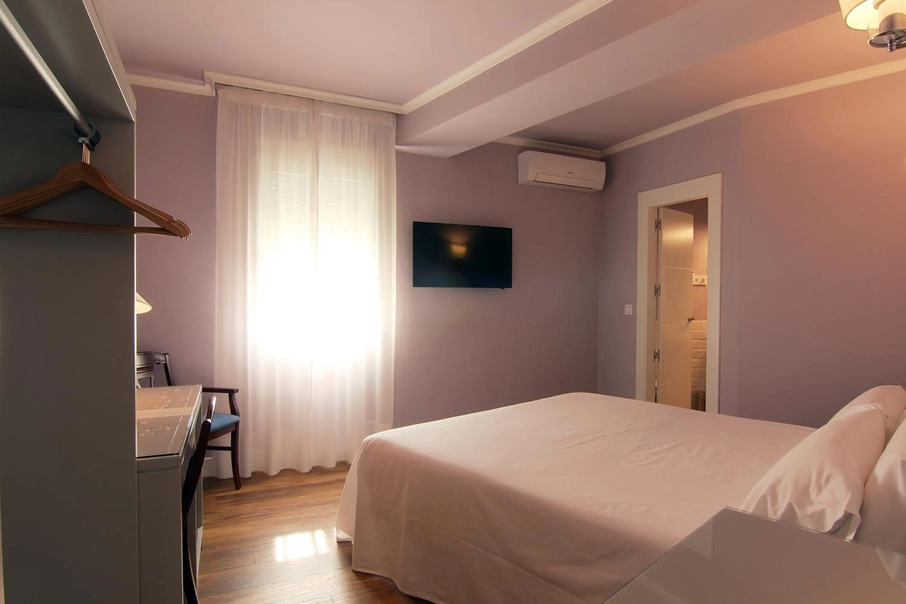 Bed in Hostal Los Castañuelos