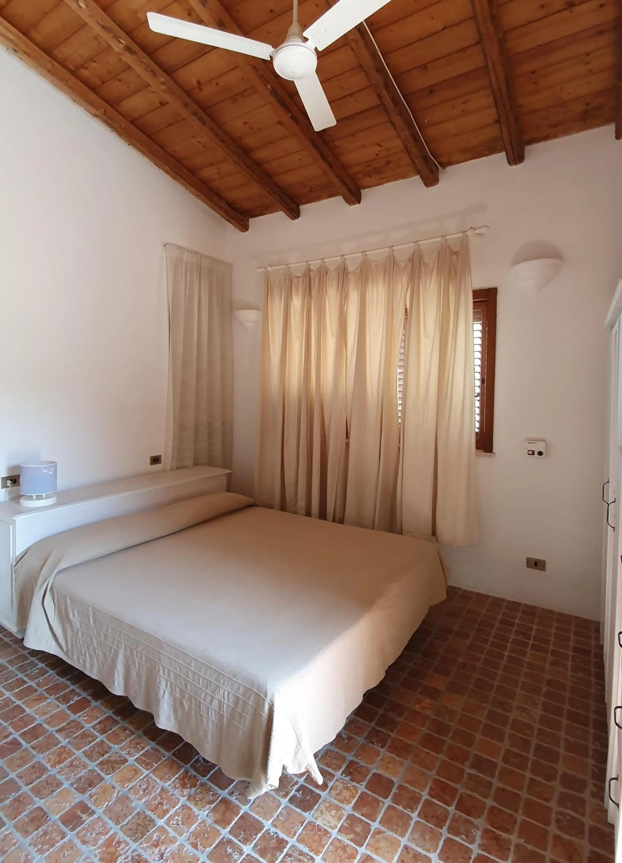Photo of the whole room, Bed in Tenuta Molino di Mare- Ecoresort