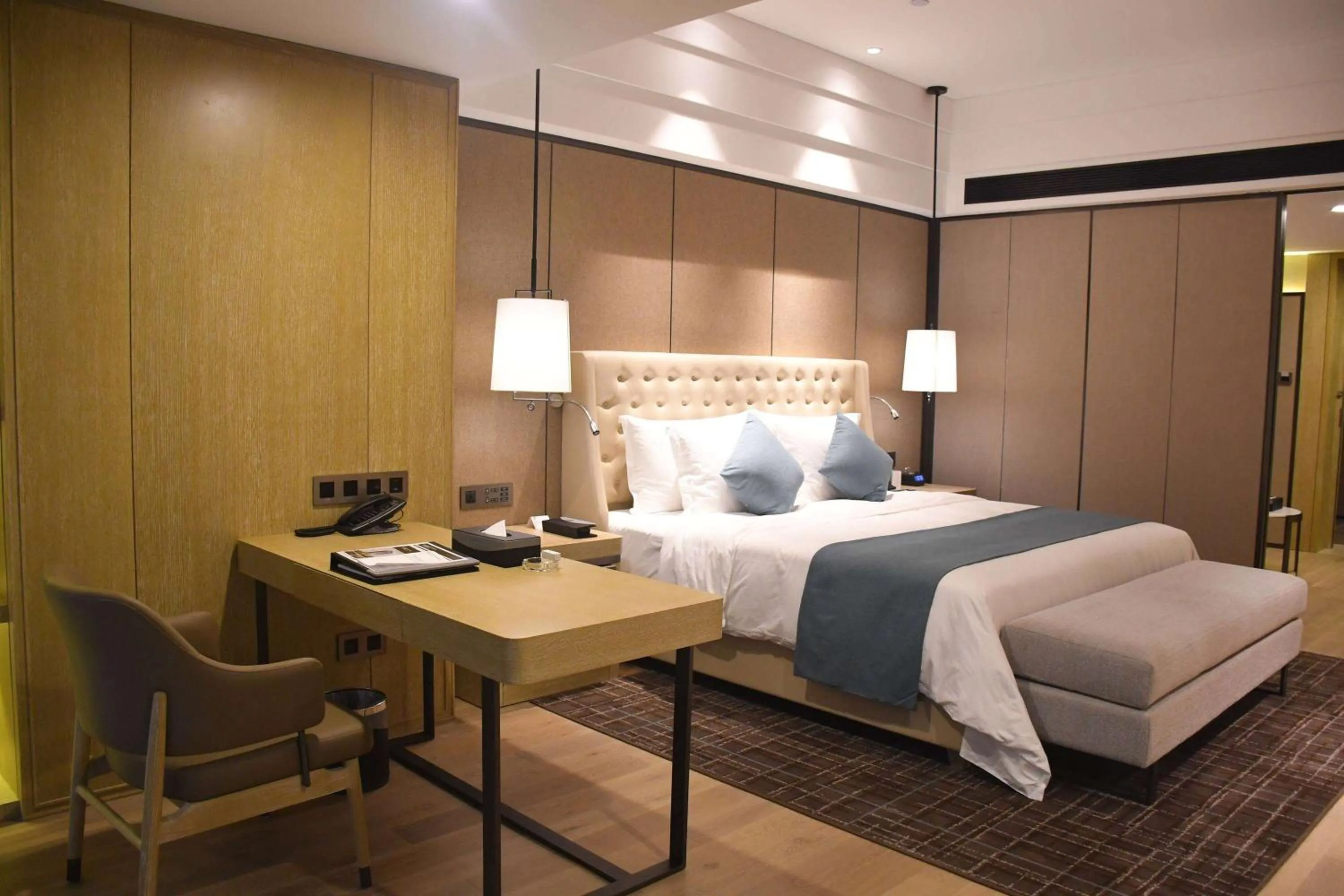Photo of the whole room, Bed in Wyndham Grand Maoming