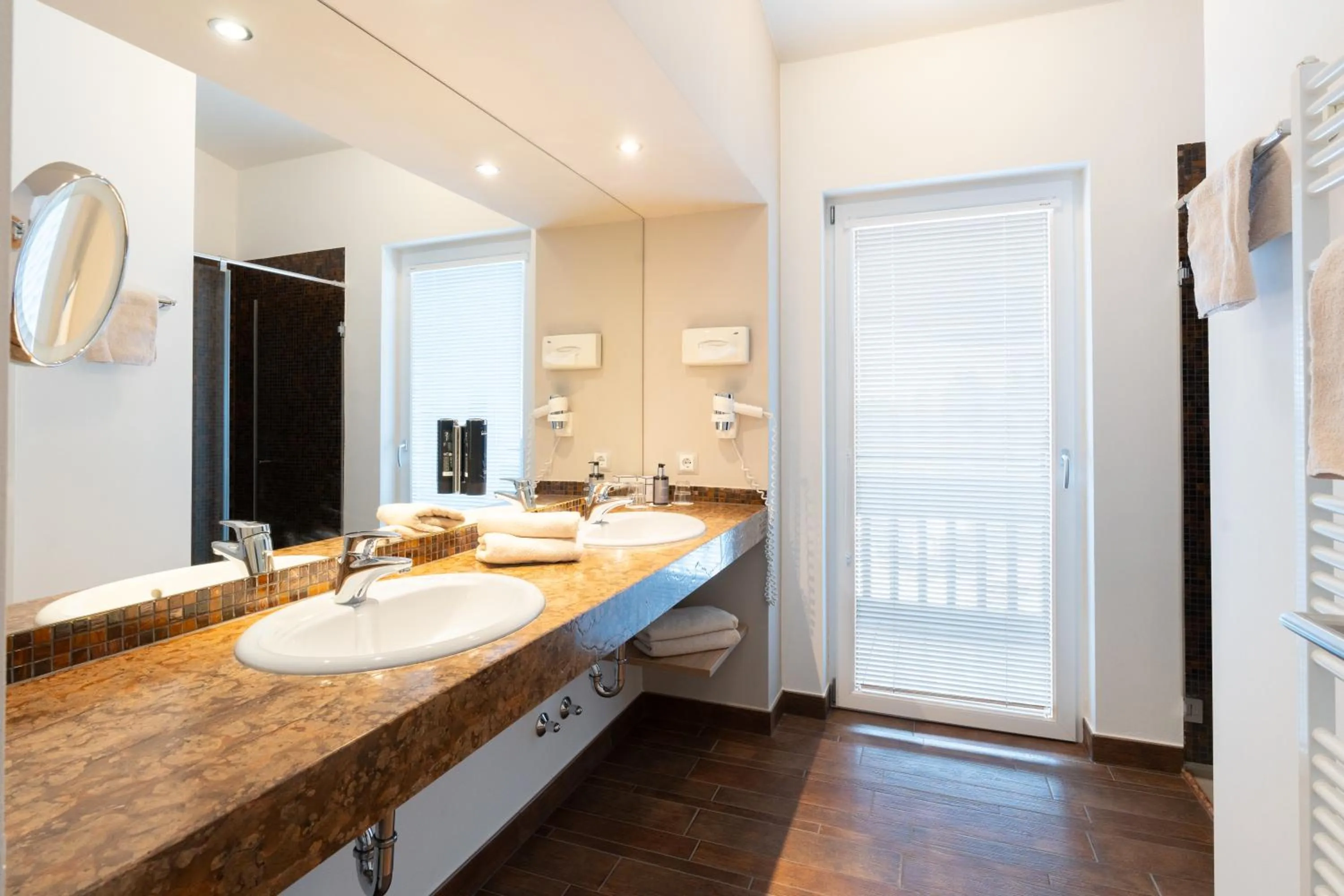 Bathroom in Hotel Hubertus