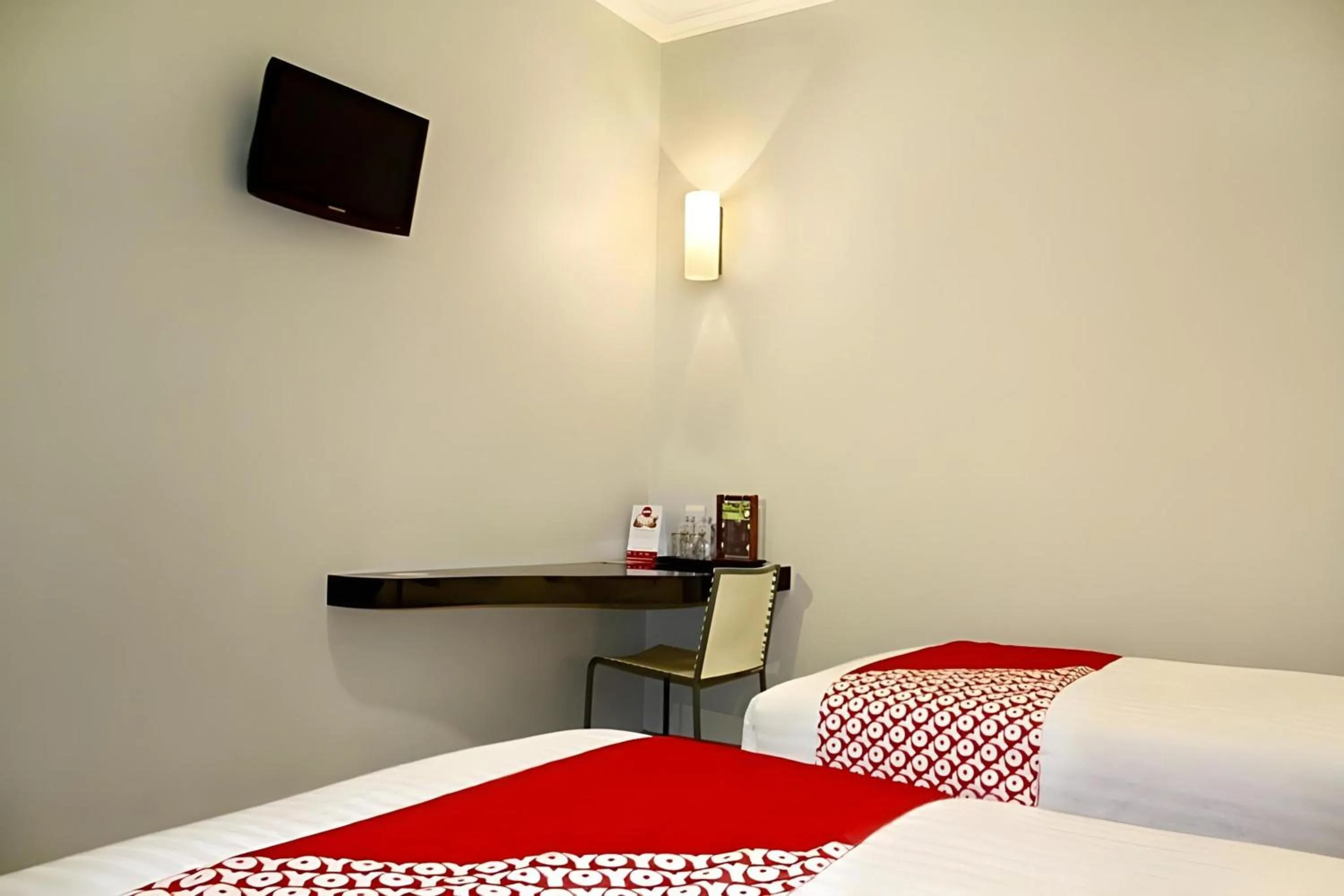 Photo of the whole room in Collection O Manggis Inn