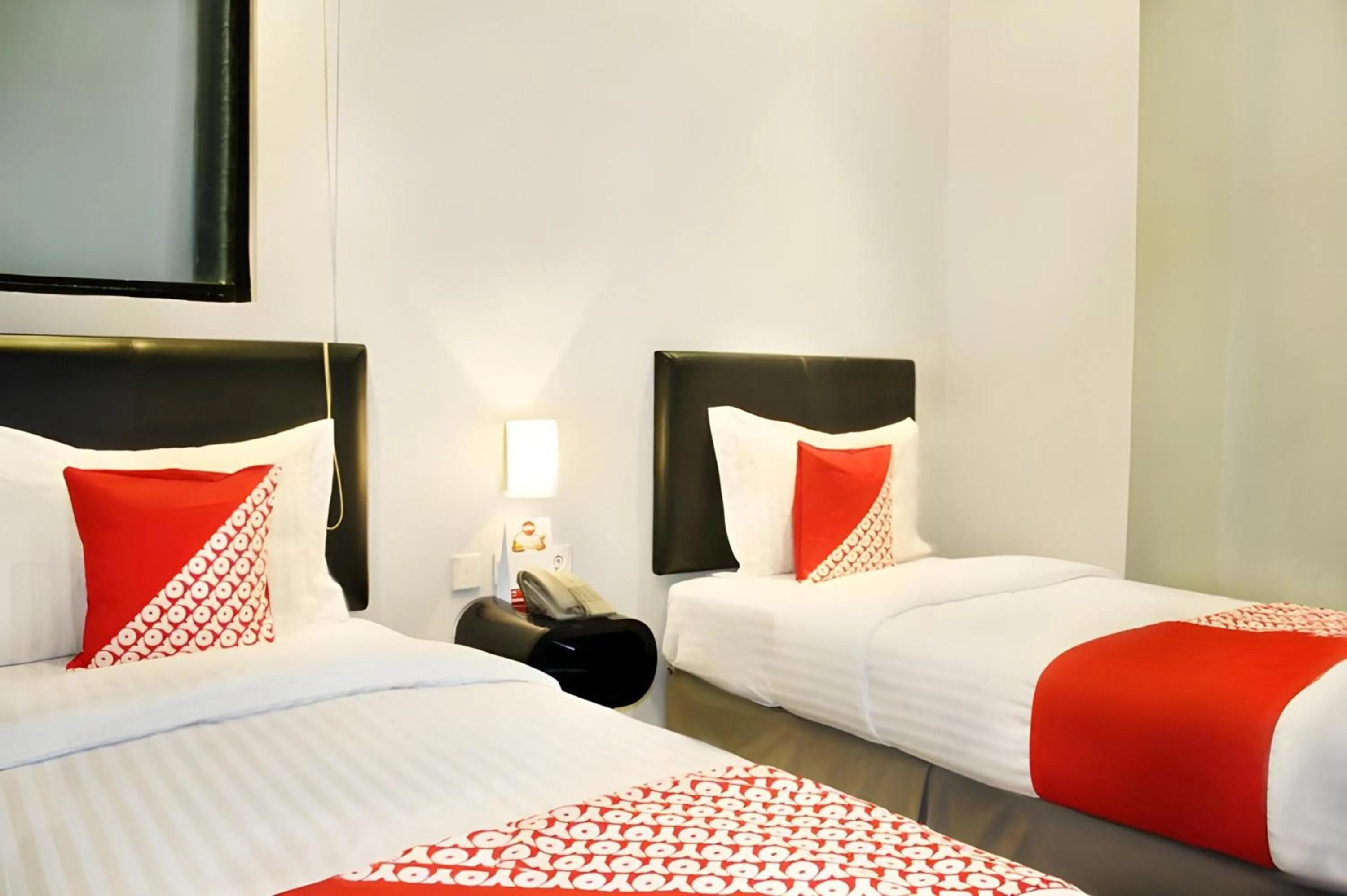 Photo of the whole room in Collection O Manggis Inn