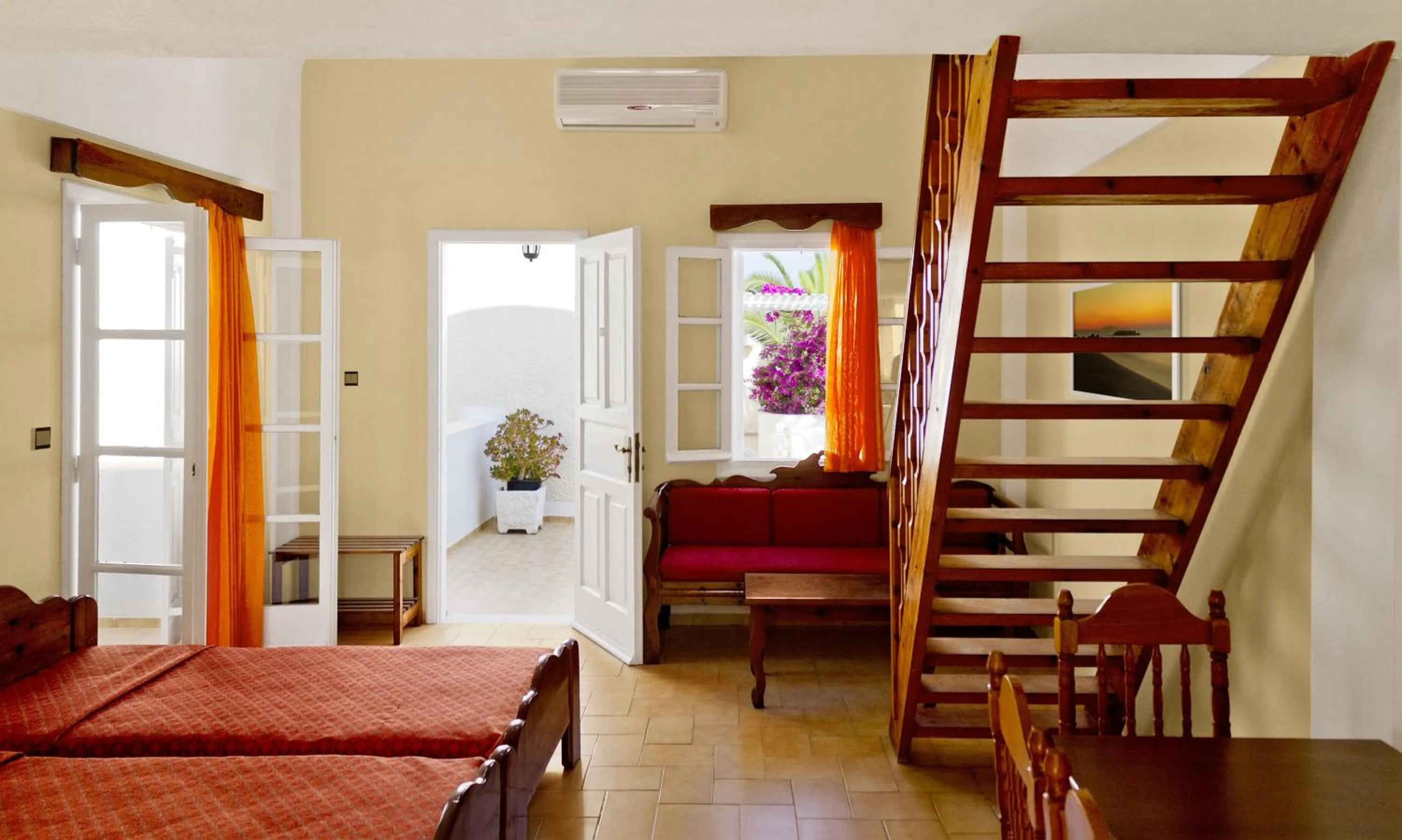 Bed in Dolphins Apartments