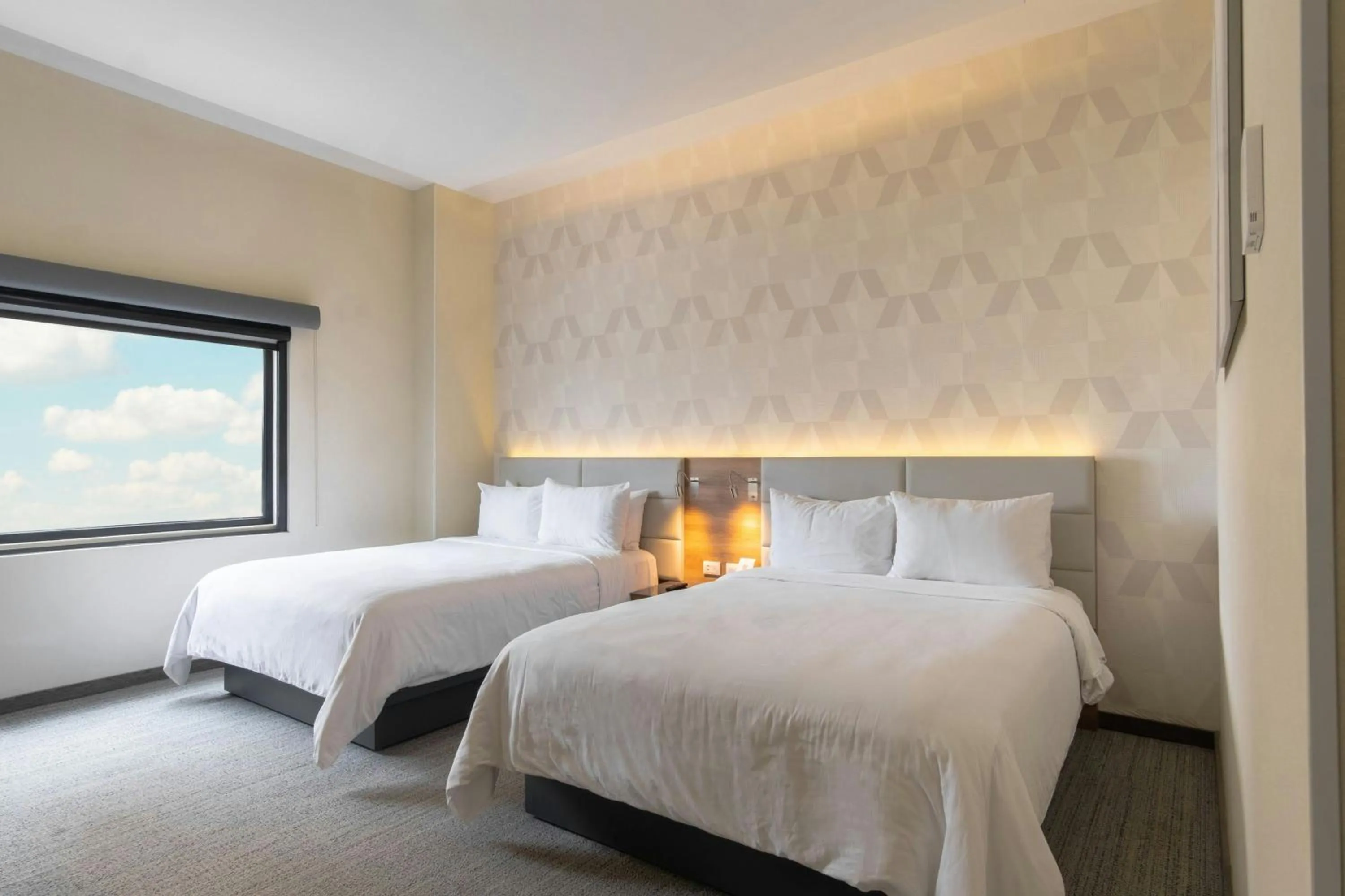 Photo of the whole room, Bed in SJ Grand Hotel Monterrey