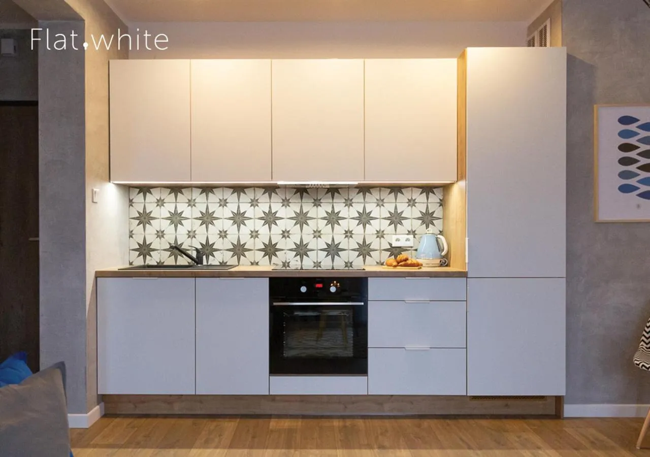 Kitchen or kitchenette in Apartamenty Flat White Zamkowa 4-6