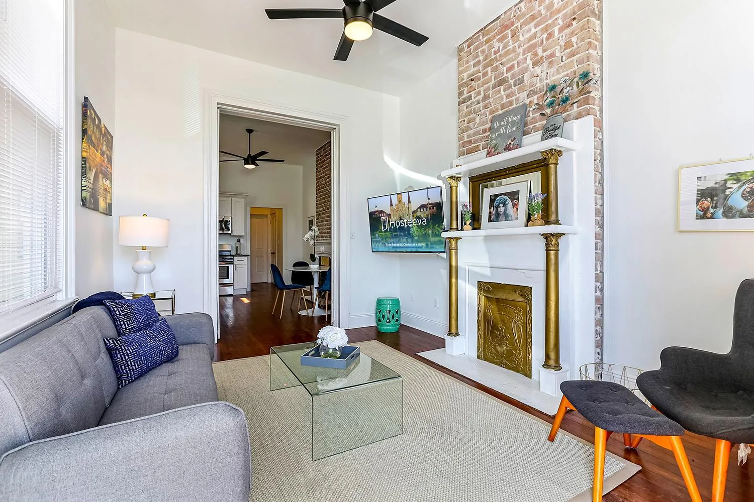 Living room in Private 2BR in Uptown by Hosteeva