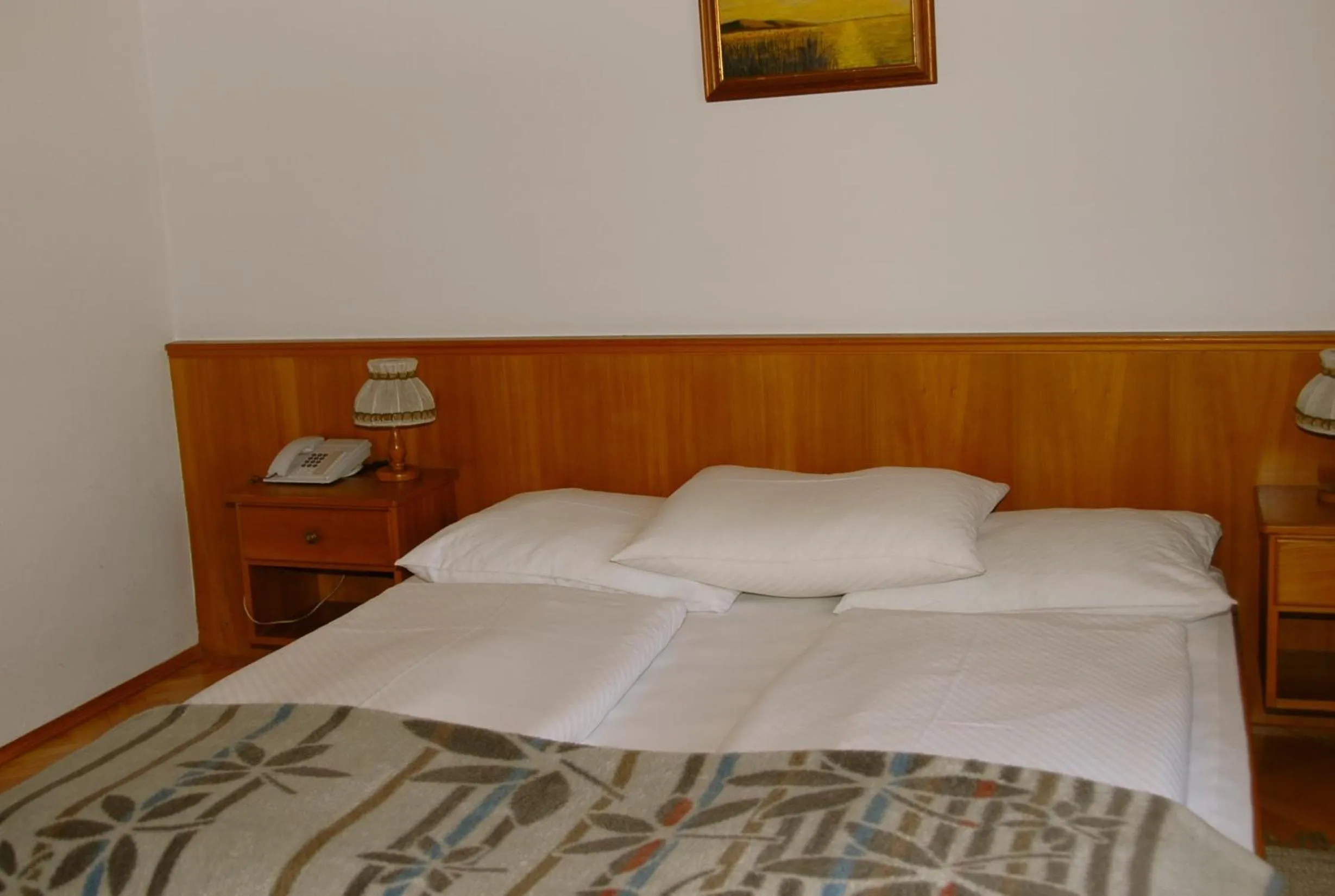 Bed in Hotel Velden Bacherlwirt