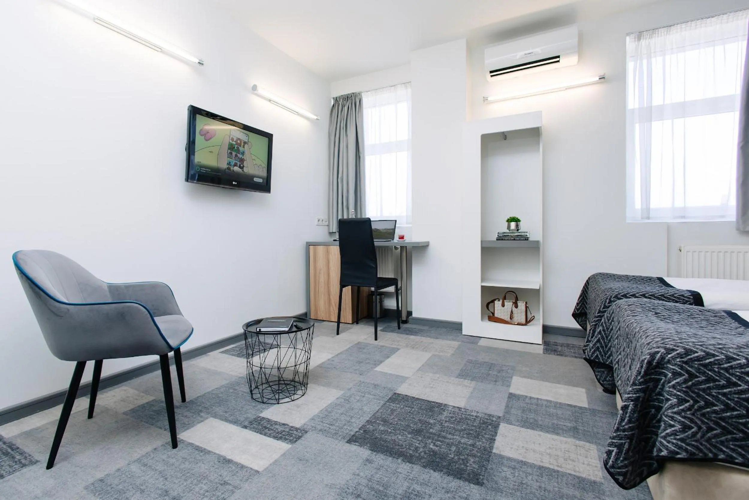 Bed in Amarant Stay by CHM