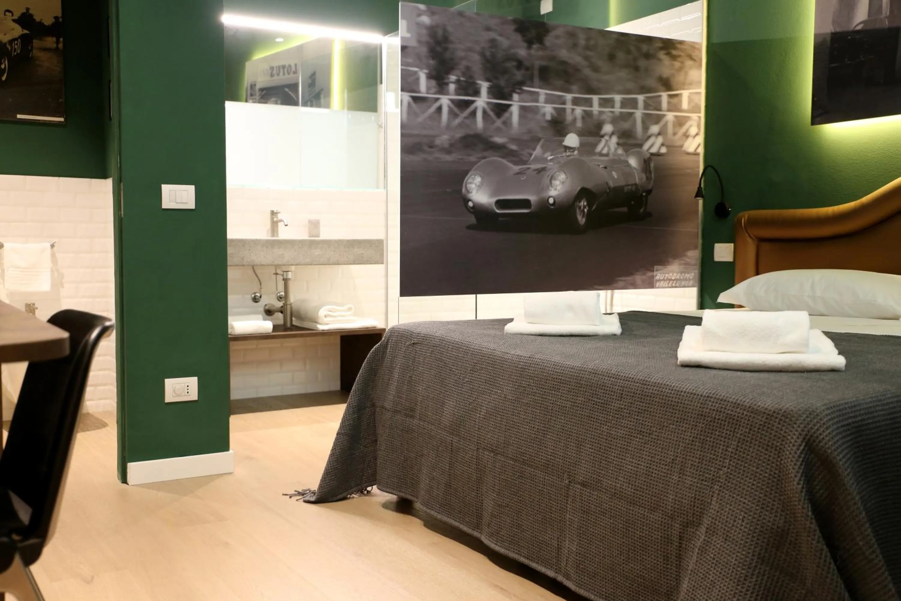 Bed in OFFICINA TESINI Guest Rooms Verona