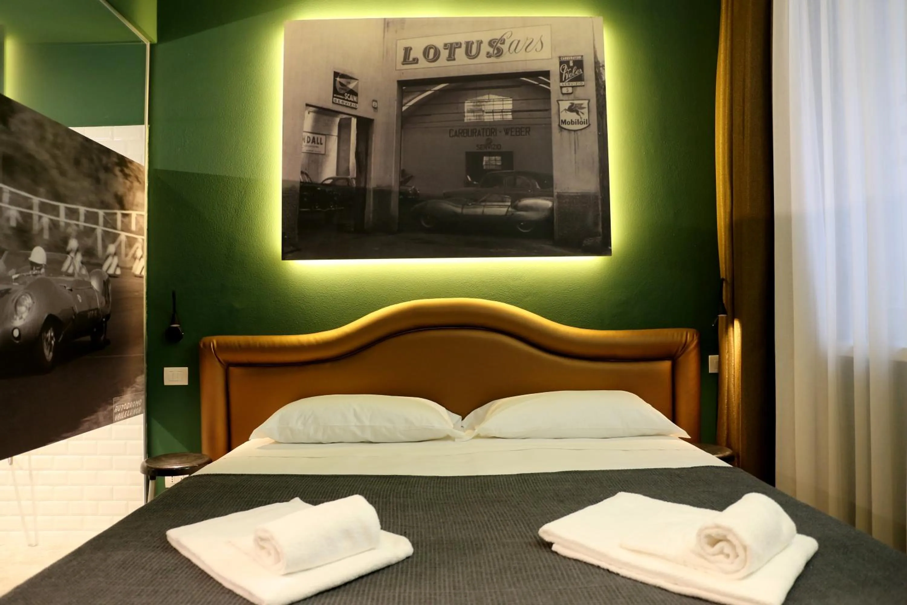 Bed in OFFICINA TESINI Guest Rooms Verona