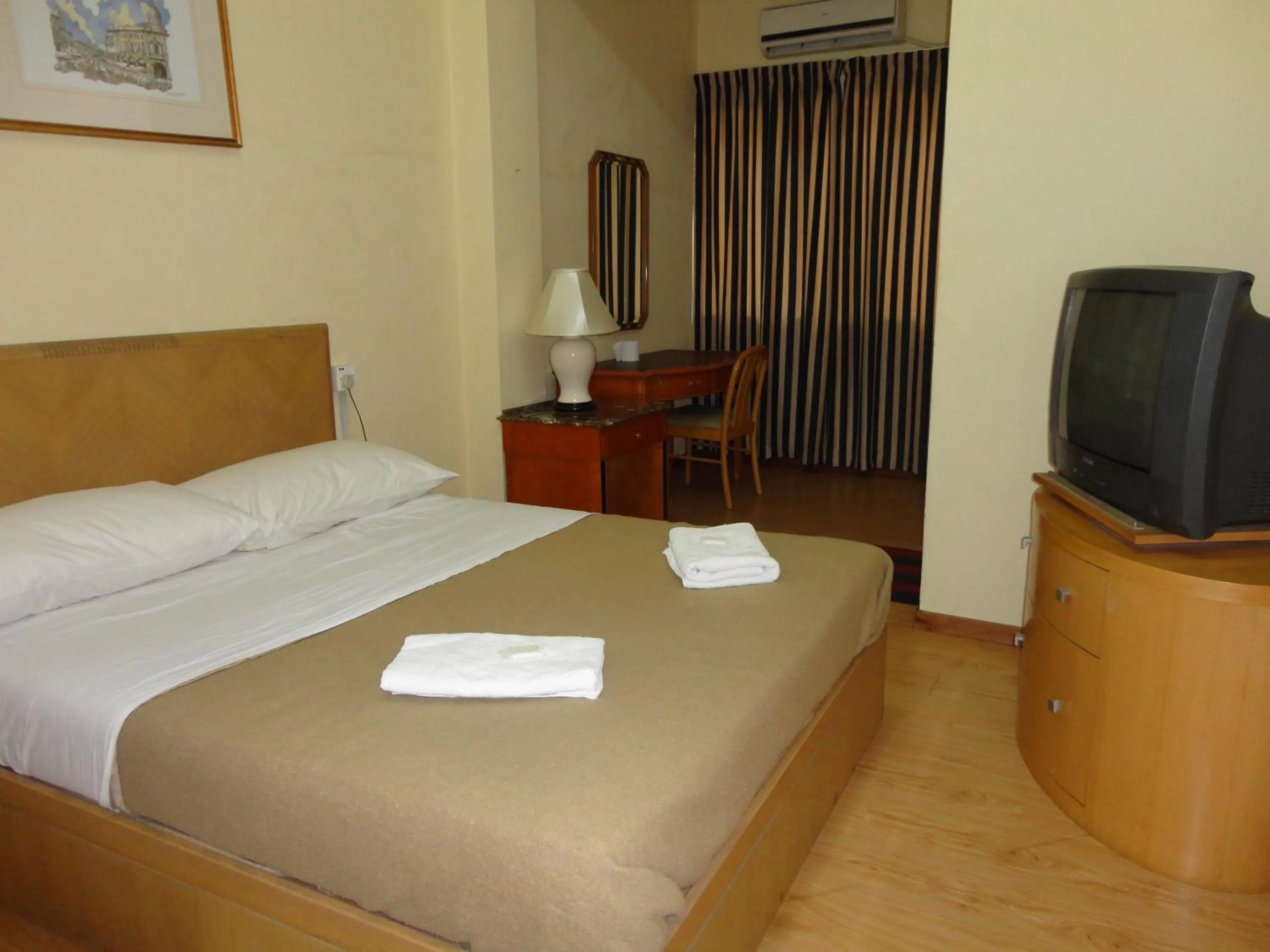 Bed in Pristine Hotel