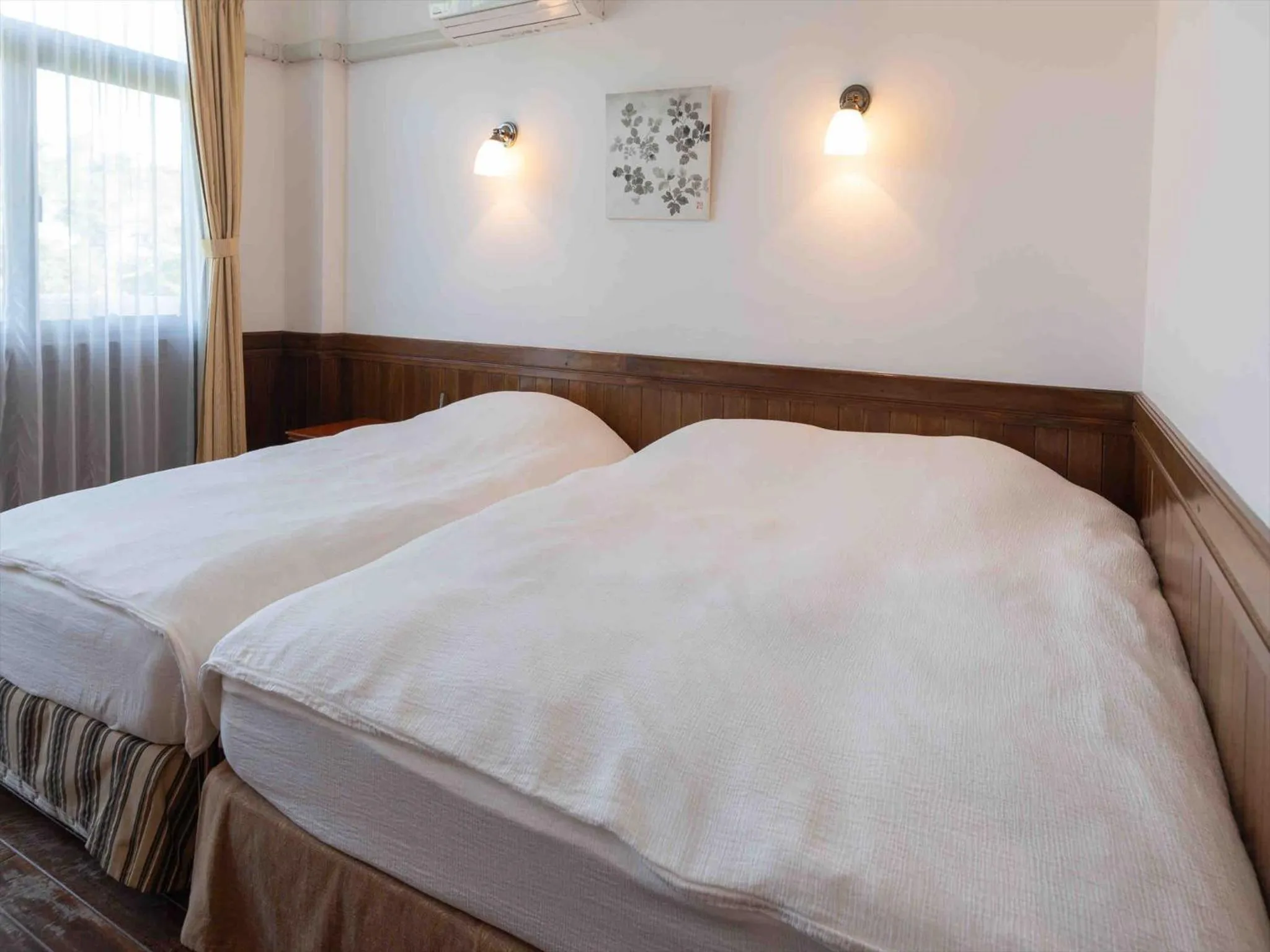 Photo of the whole room, Bed in Ada Garden Hotel Okinawa