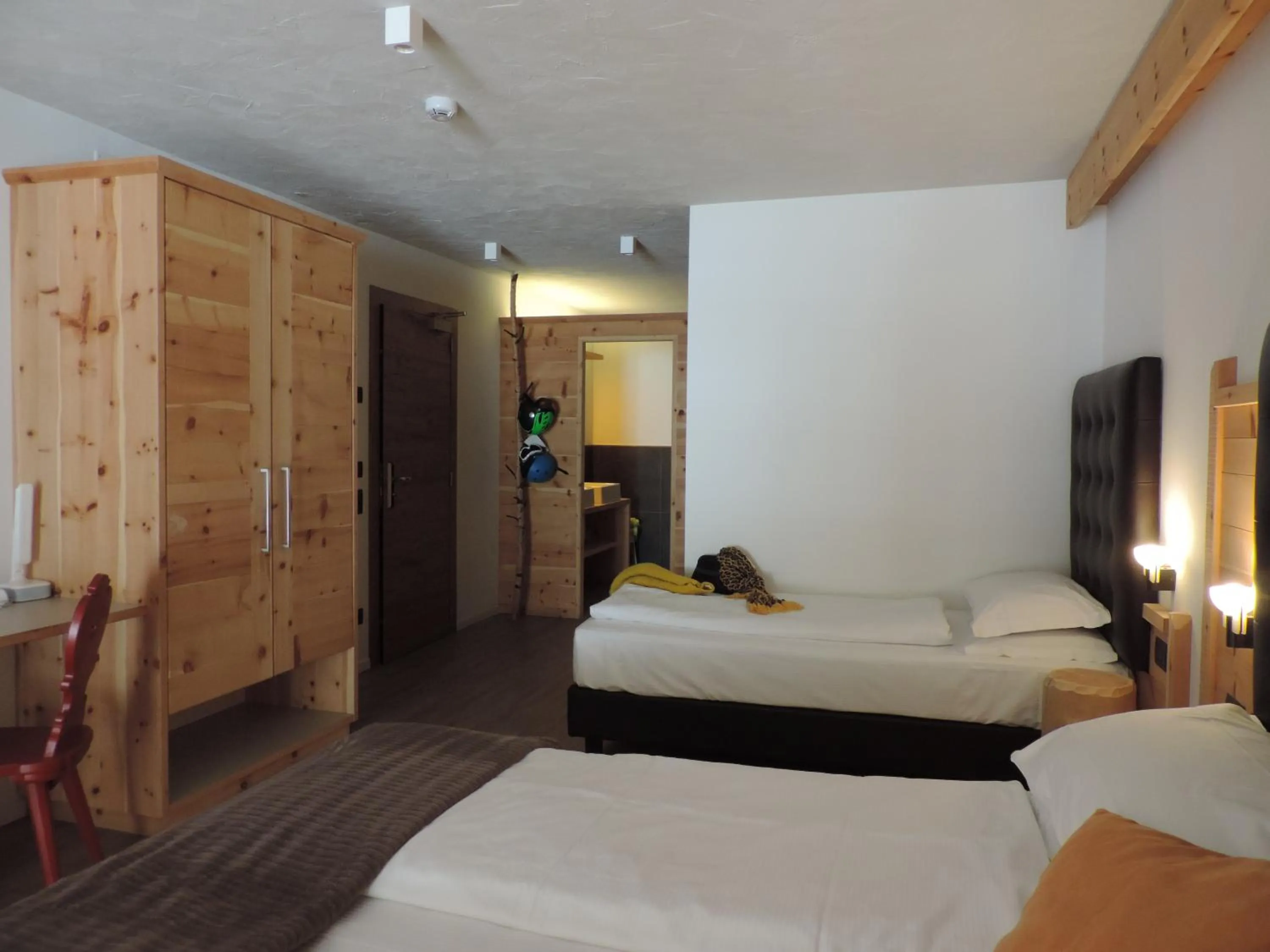 Bed in Hotel Scoiattolo