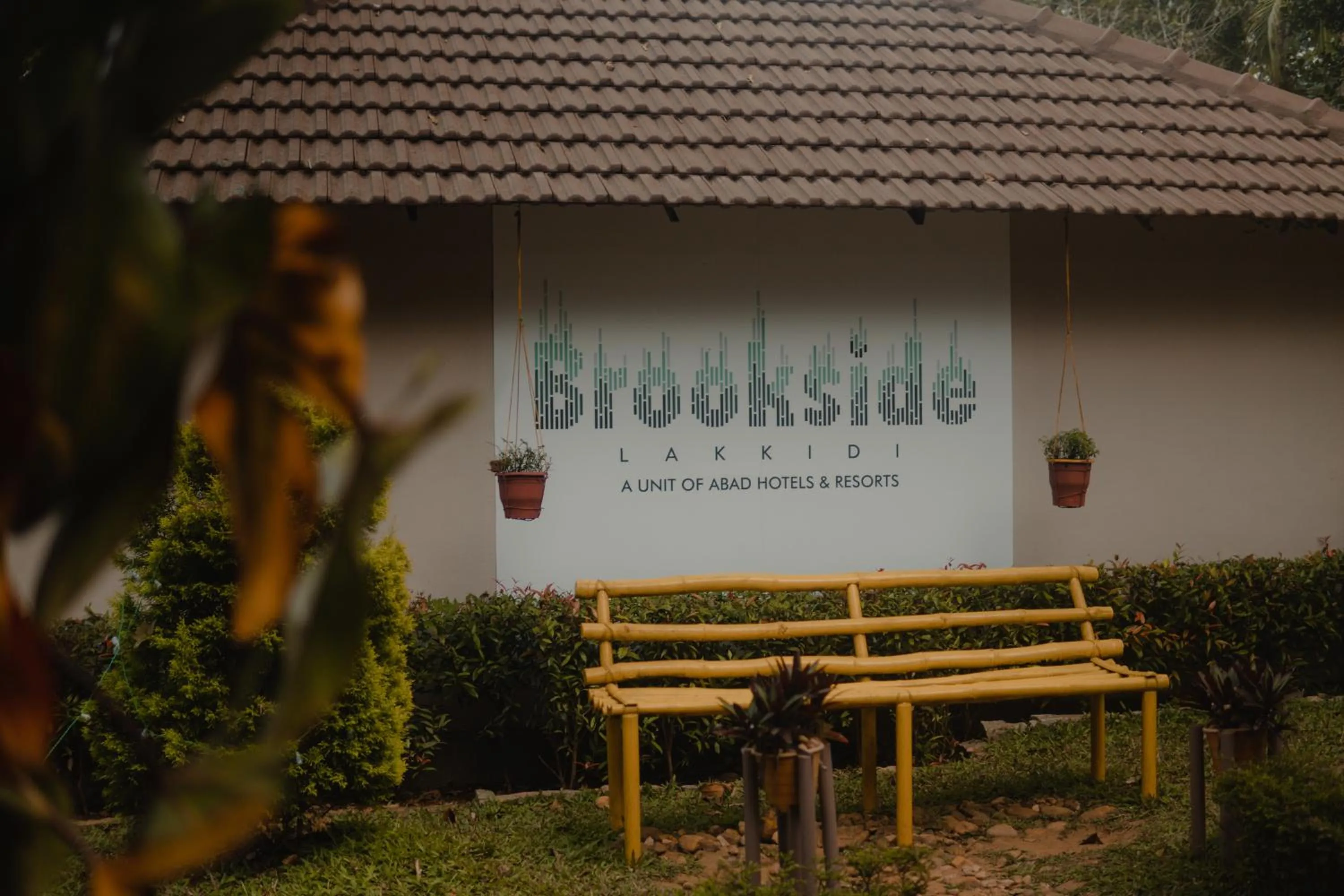 Property logo or sign in Abad Brookside Wayanad