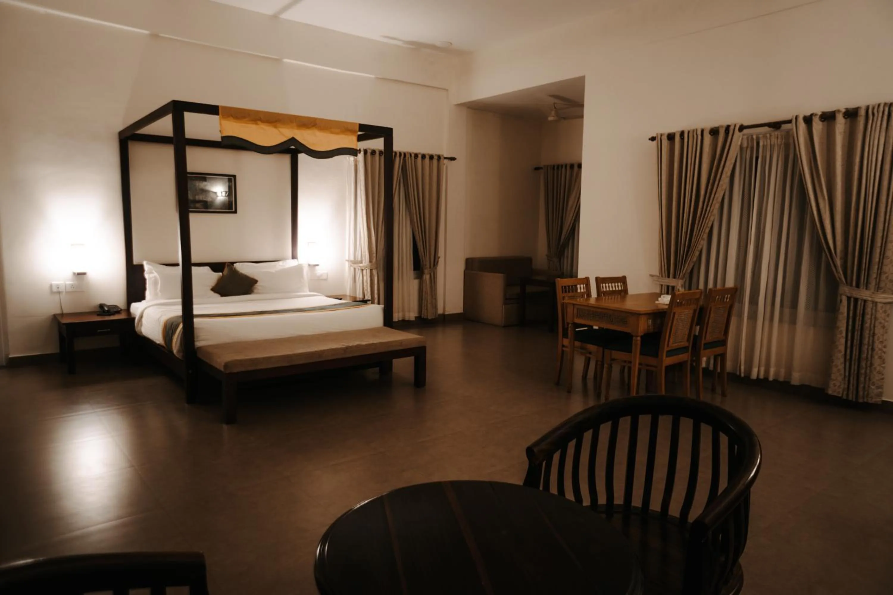 Photo of the whole room, Bed in Abad Brookside Wayanad