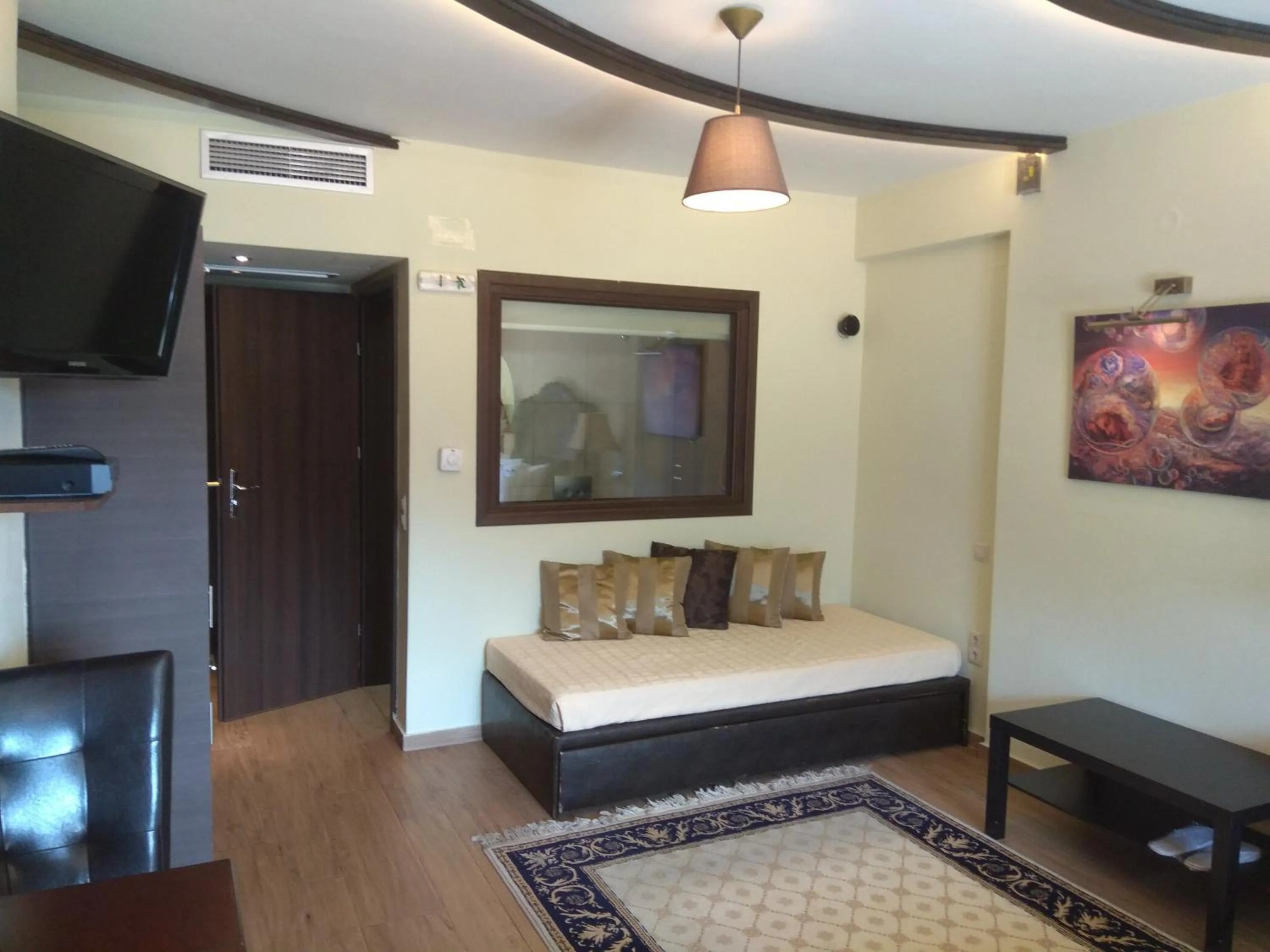 Photo of the whole room in Archontopetra Boutique Hotel