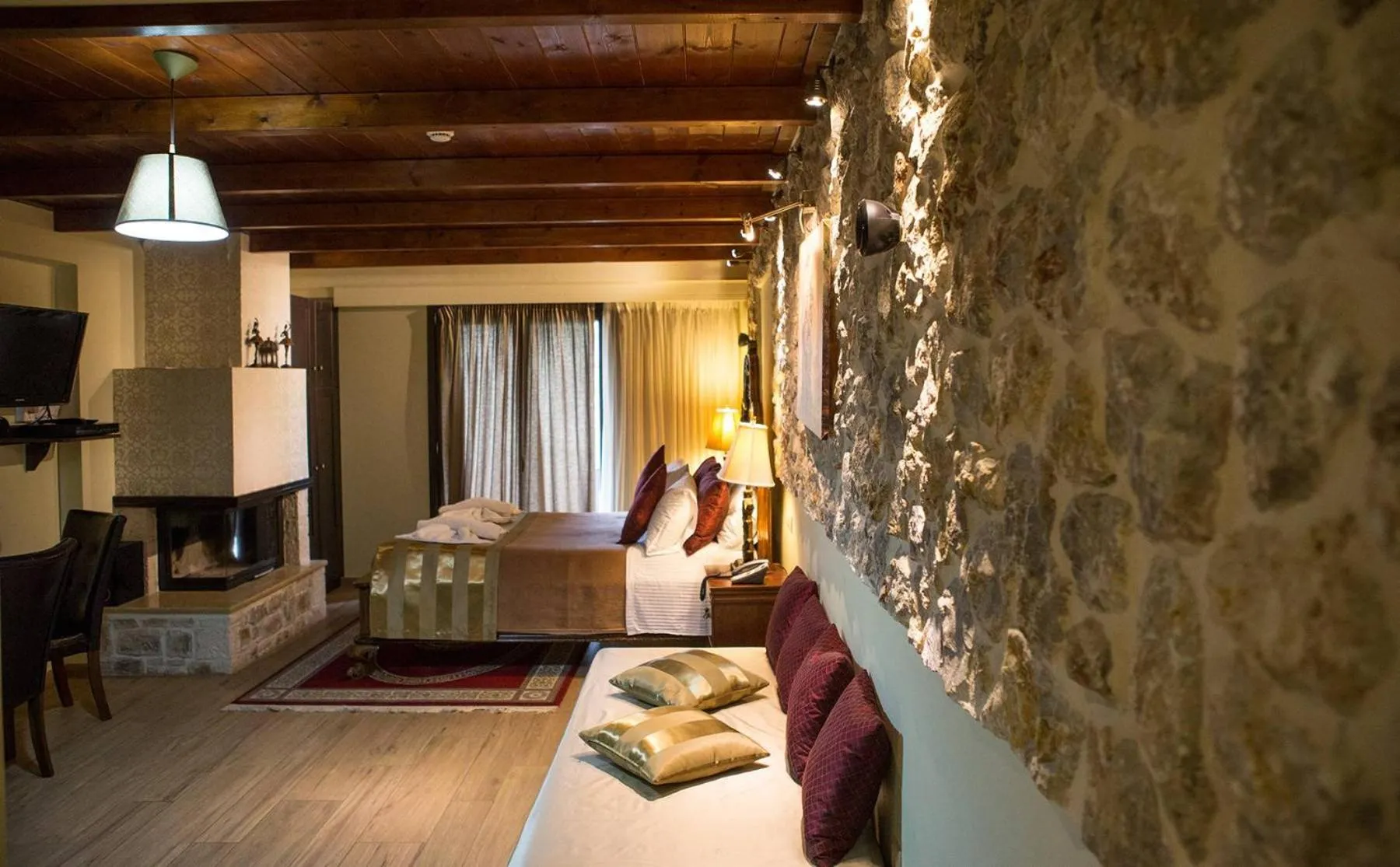 Bed in Archontopetra Boutique Hotel