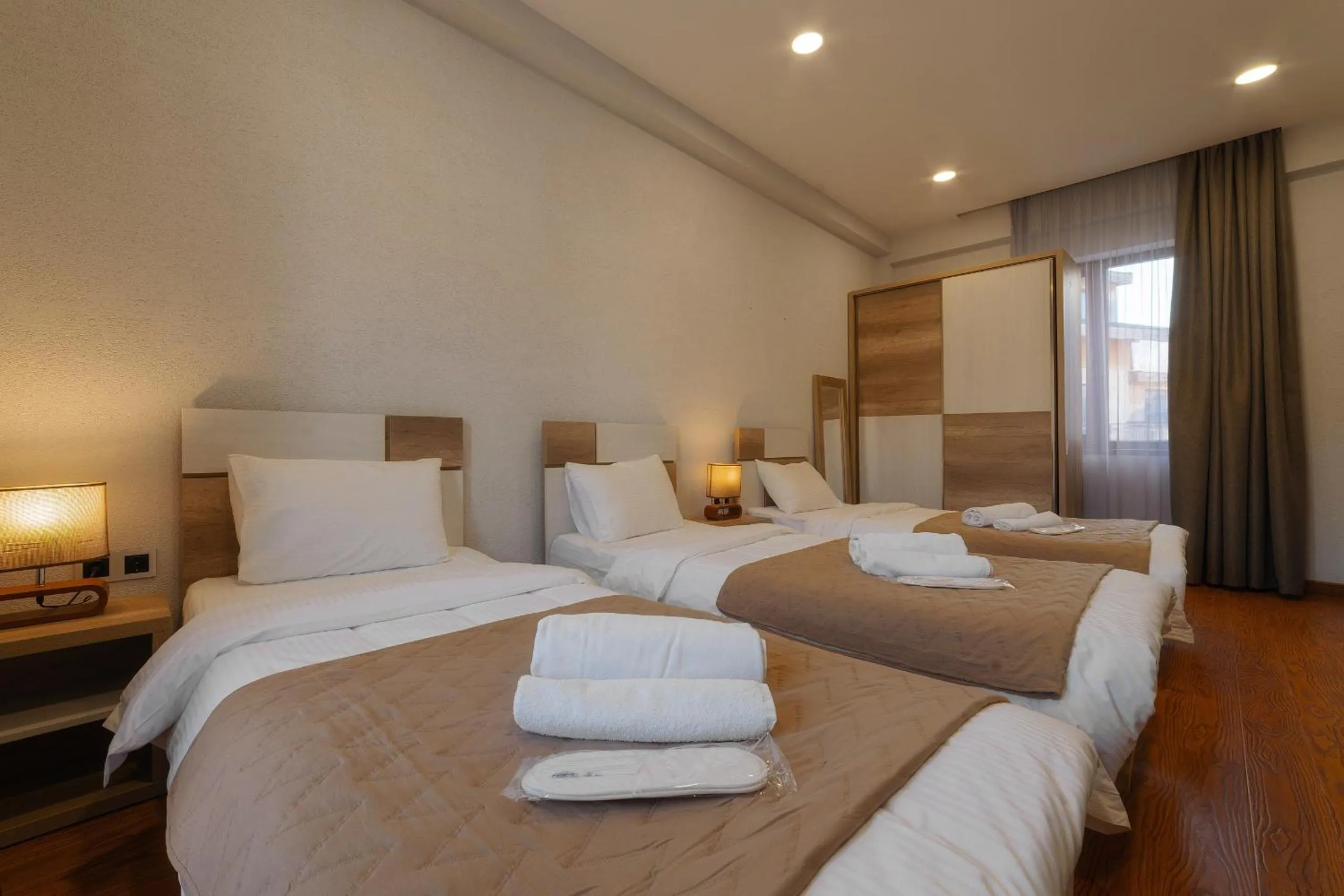 Bed in Ereto Hotel by SnowTime