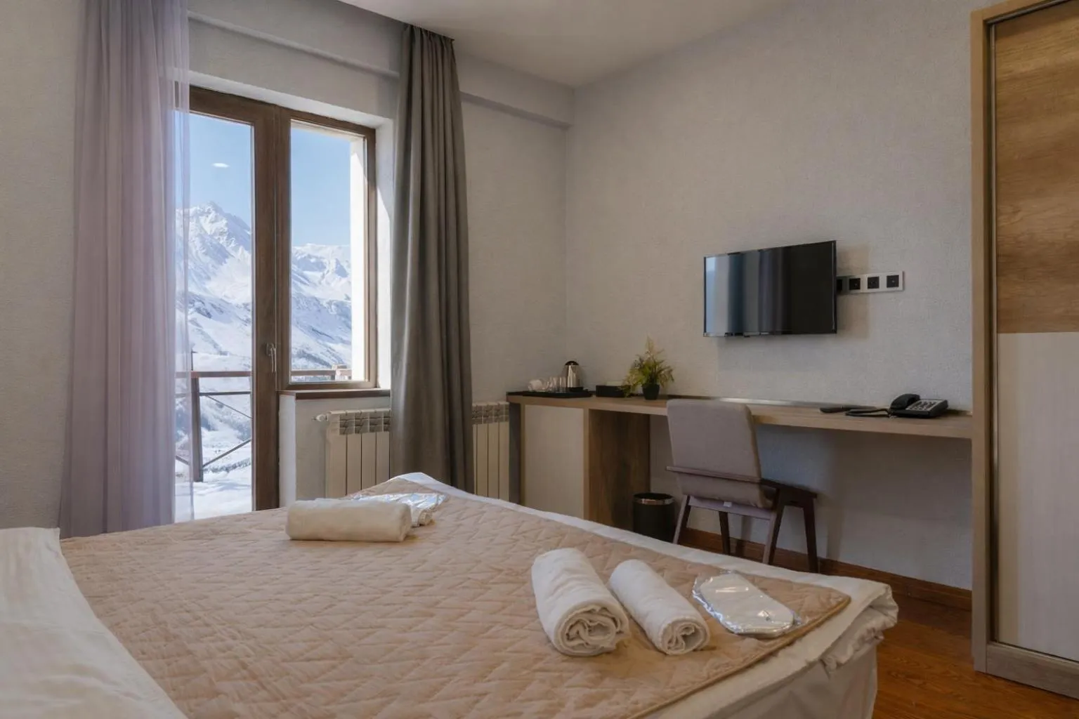 Bed in Ereto Hotel by SnowTime