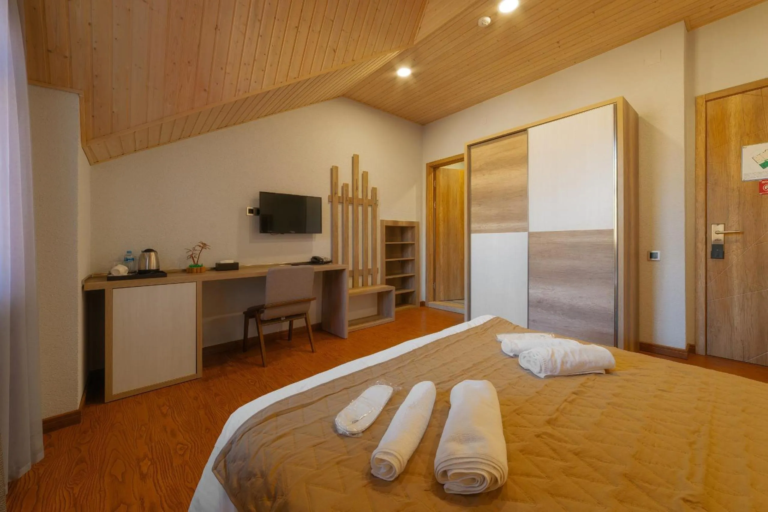 Bed in Ereto Hotel by SnowTime