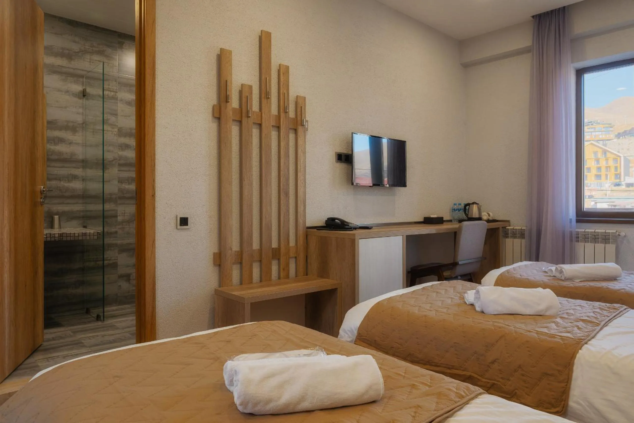 Bed in Ereto Hotel by SnowTime