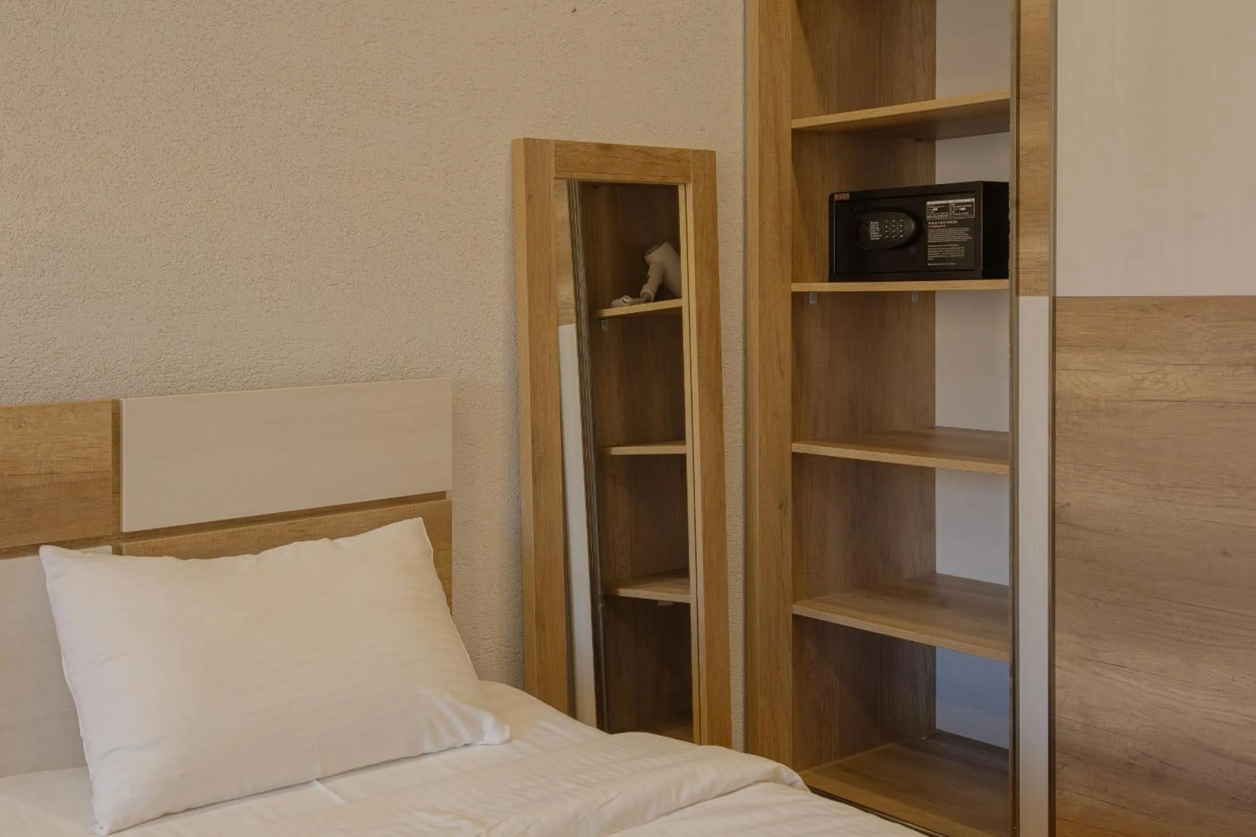 Bed in Ereto Hotel by SnowTime