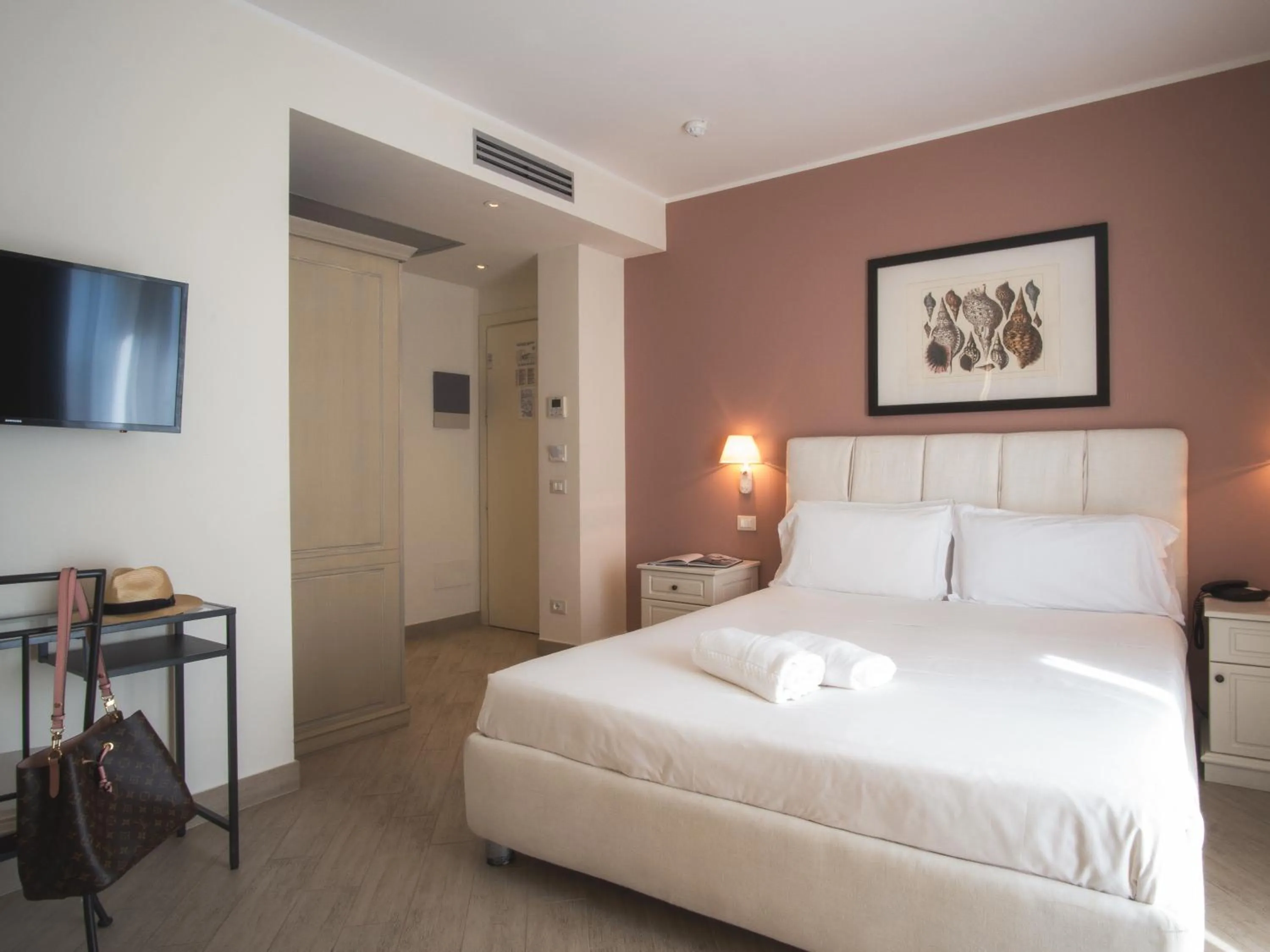 Bed in Hotel San Pietro Palace