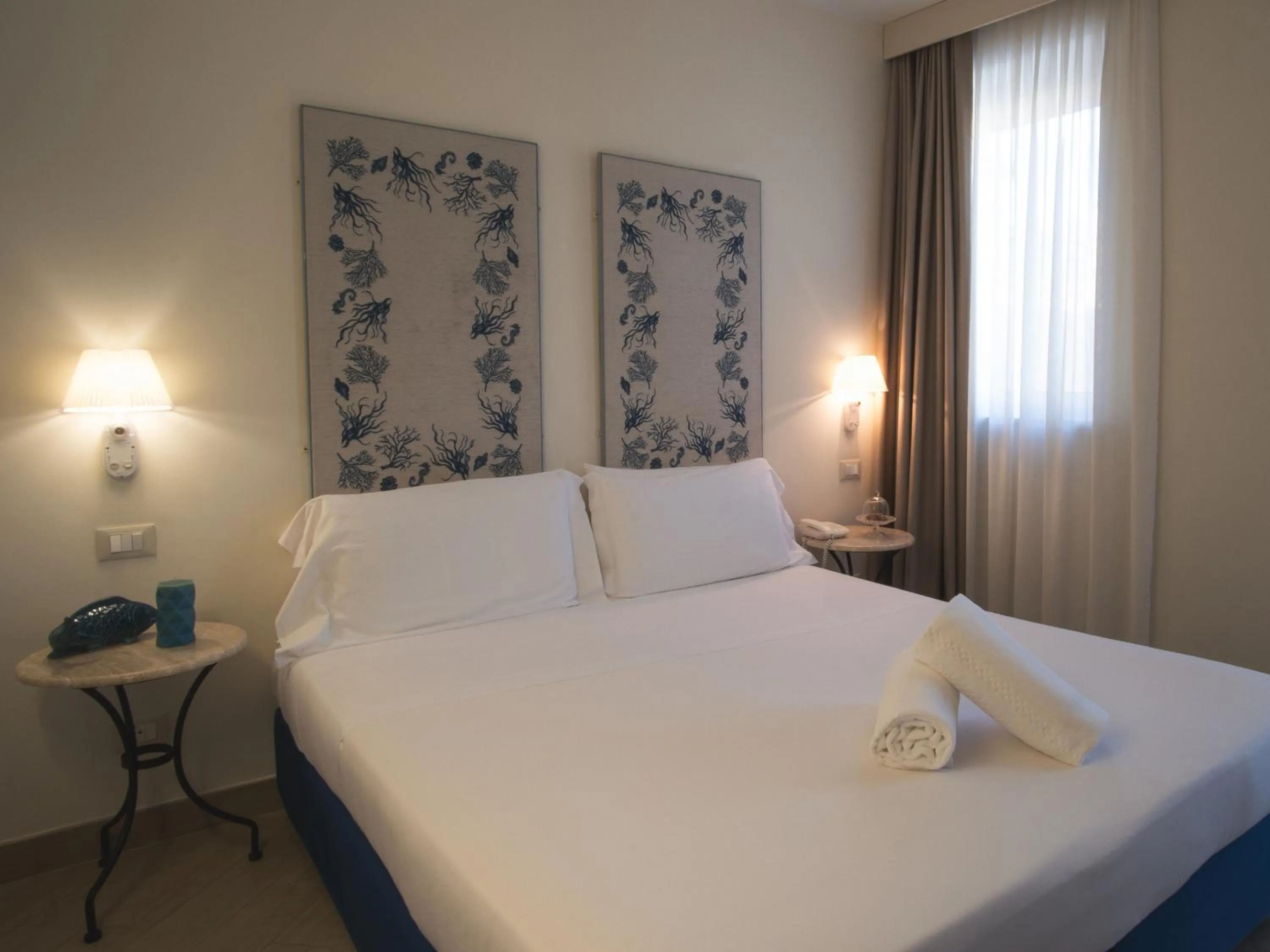 Bed in Hotel San Pietro Palace