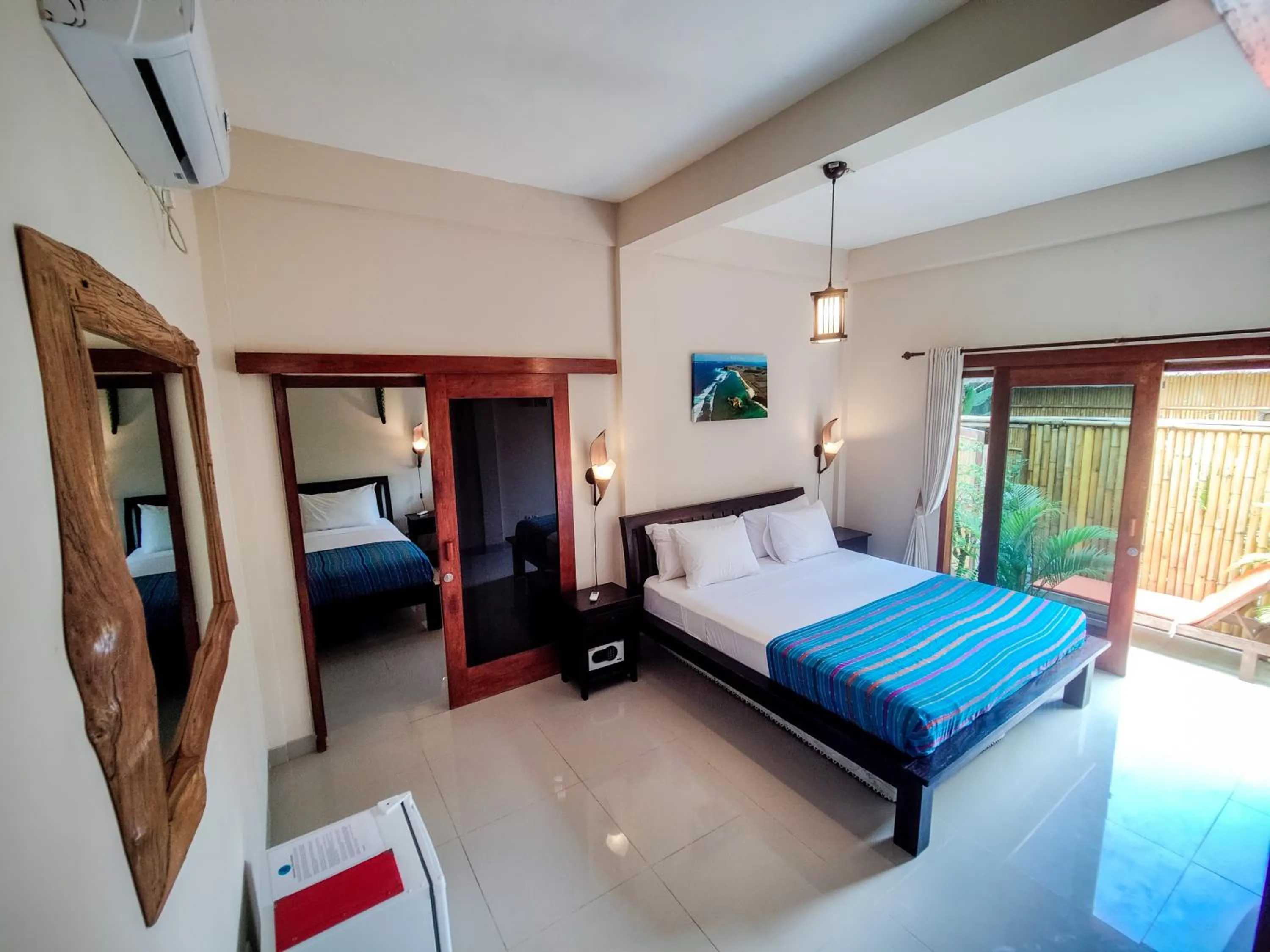 Bed in Ekas Surf Resort & Surf Camp