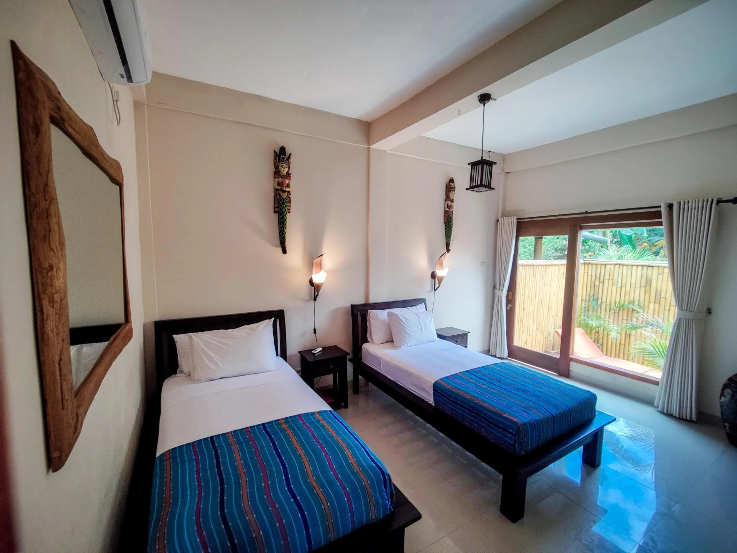 Bed in Ekas Surf Resort & Surf Camp