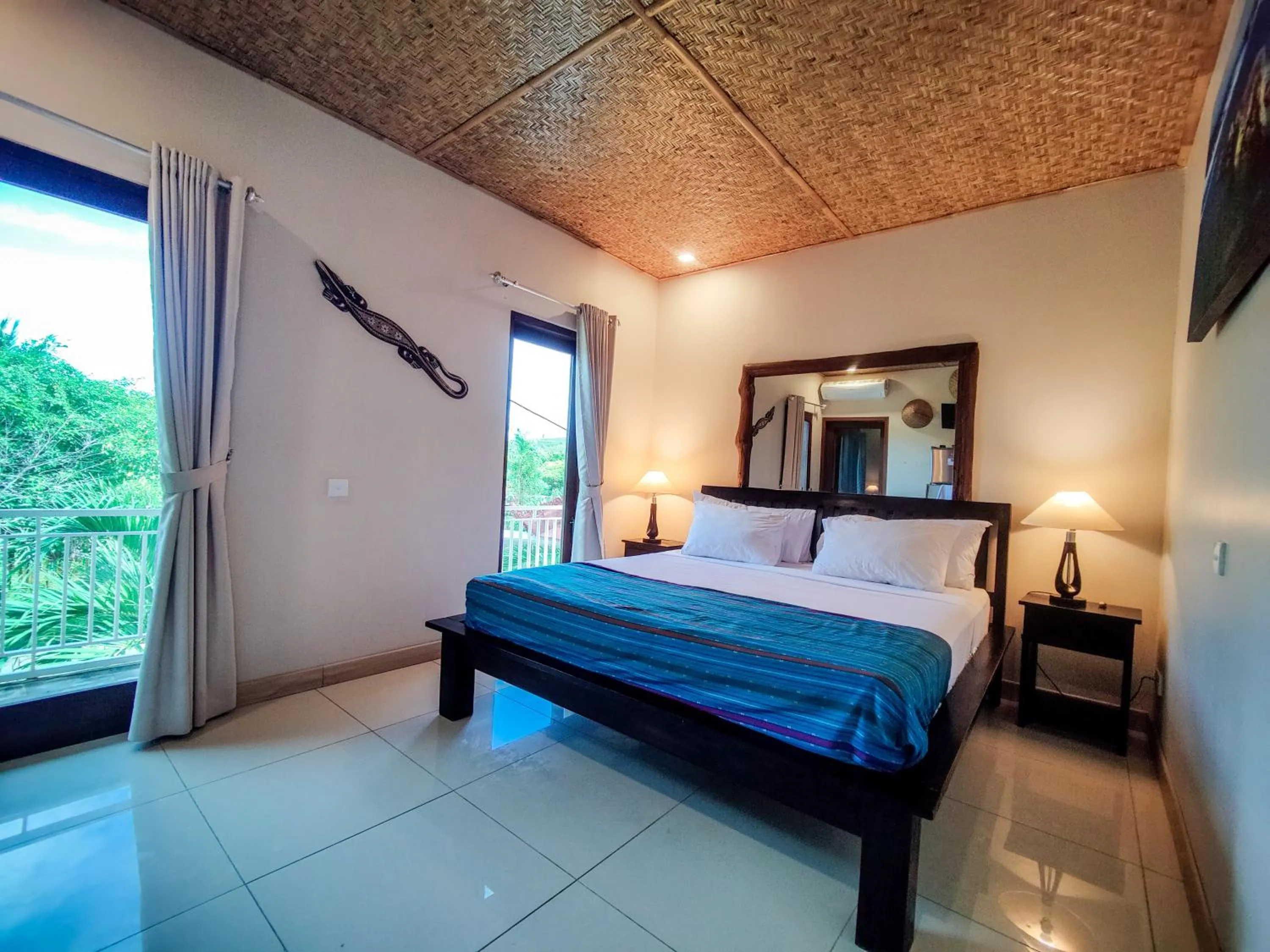 Bed in Ekas Surf Resort & Surf Camp