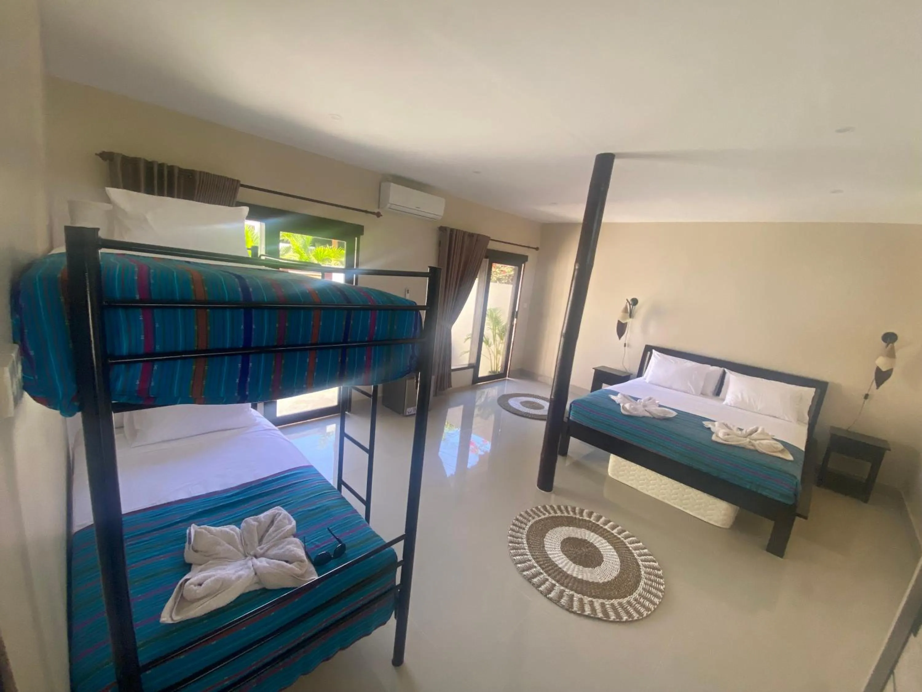 Bed in Ekas Surf Resort & Surf Camp