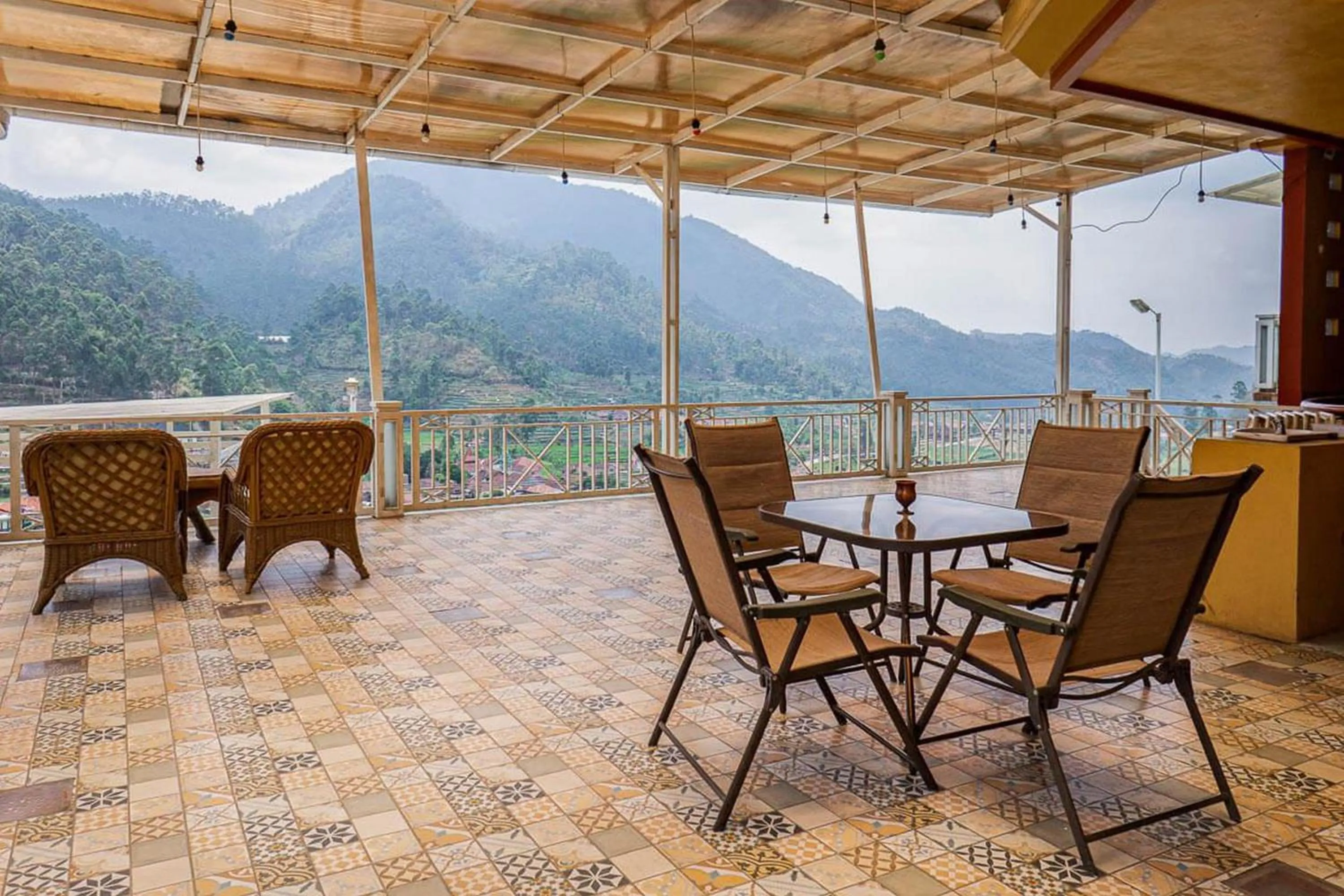 Seating area in RedDoorz near Kawah Putih Ciwidey