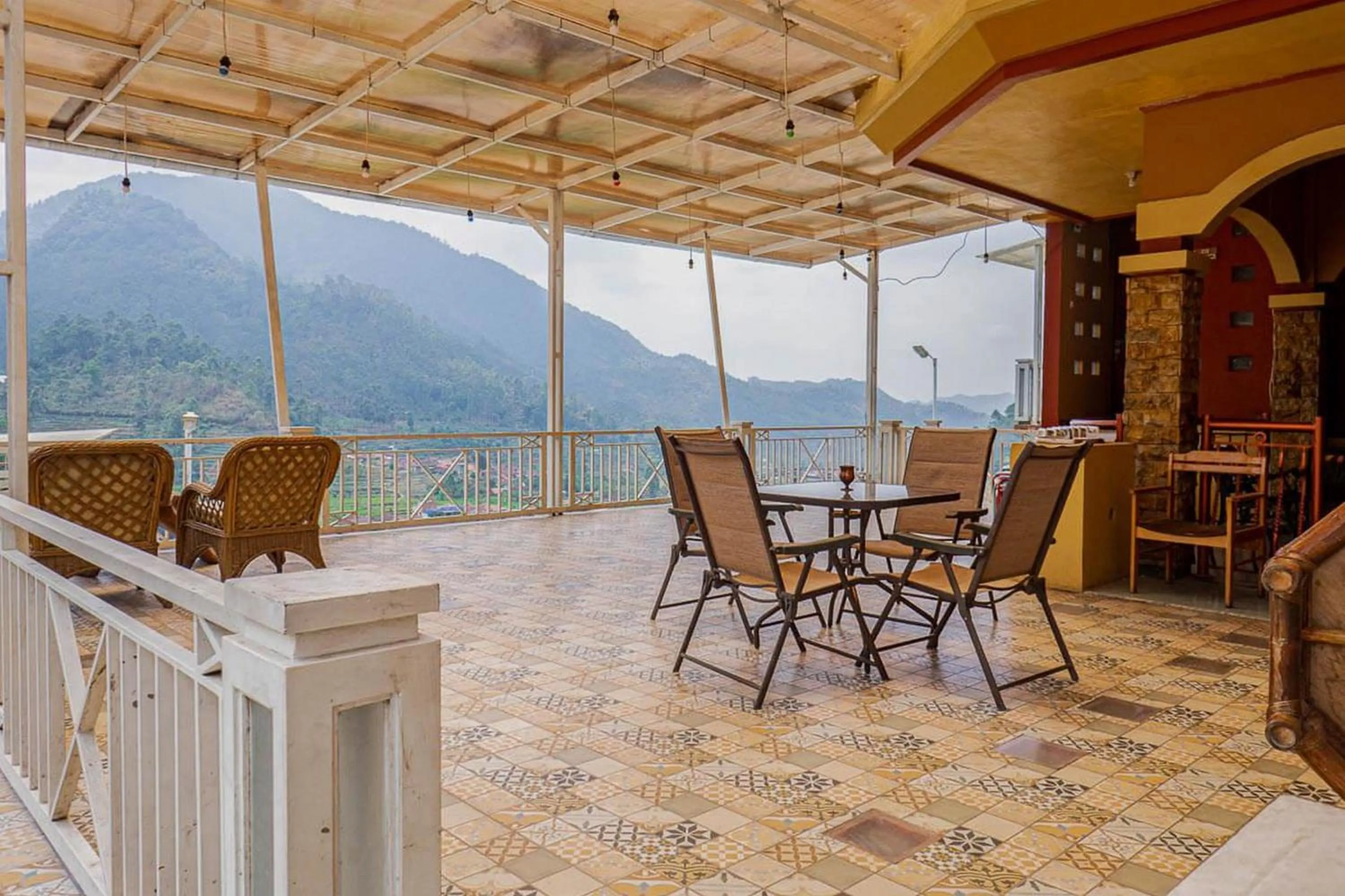 Seating area in RedDoorz near Kawah Putih Ciwidey
